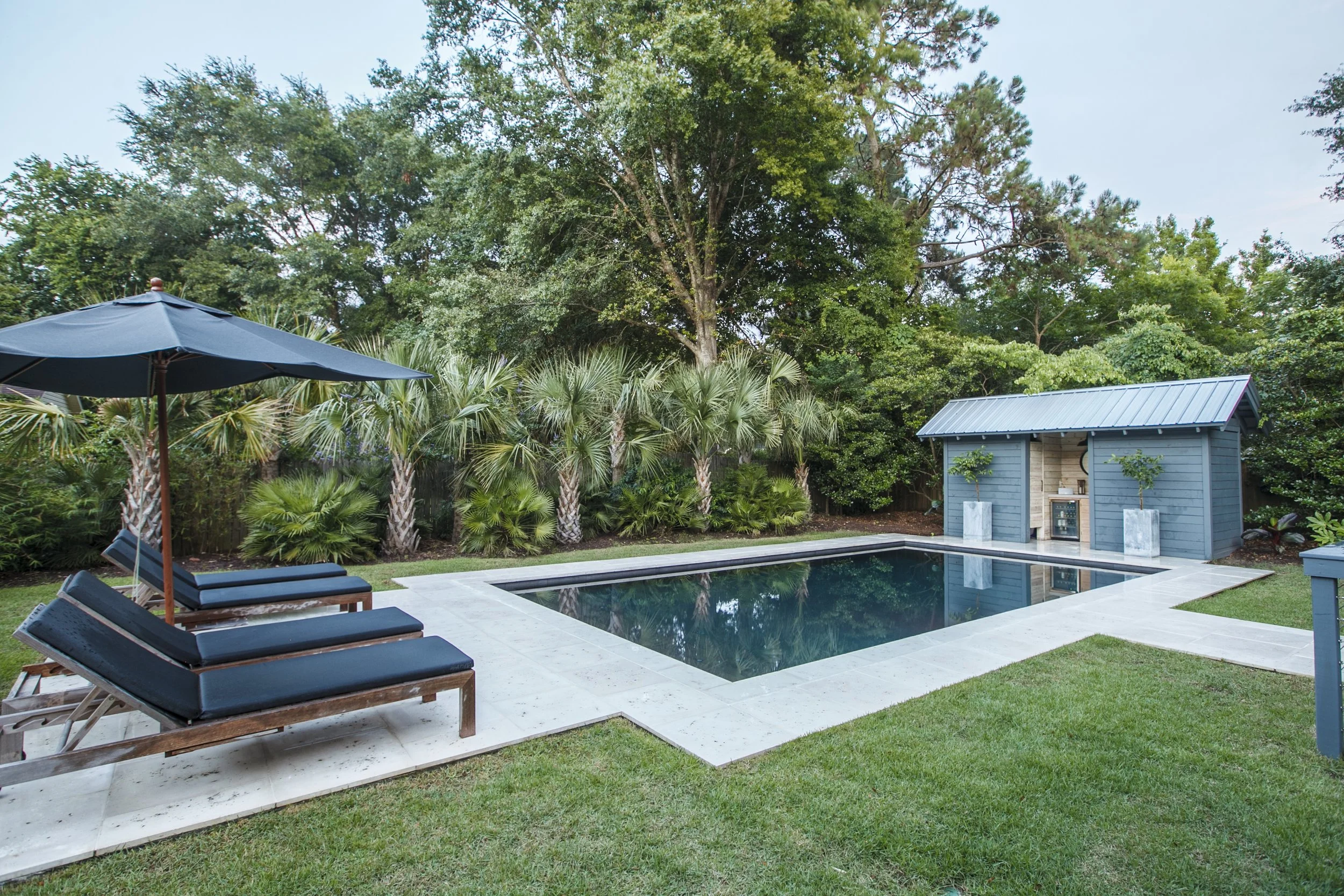 FireRock wet cast concrete pavers in a luxury pool hardscape in color 'Oyster'