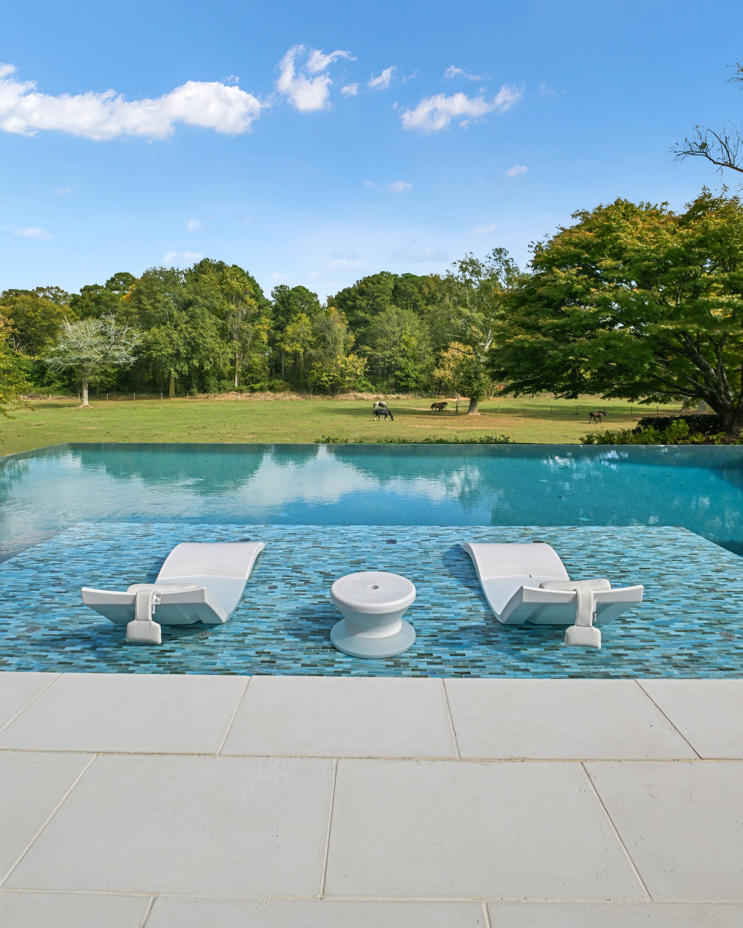 FireRock Oyster Concrete Pavers on a Pool Deck