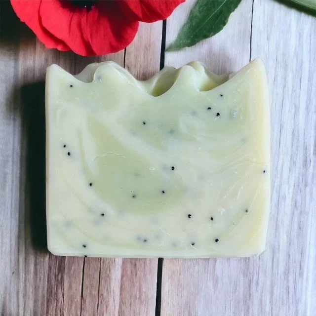 Poppy and tea tree handmade soap bar with green clay and poppy seed exfoliation