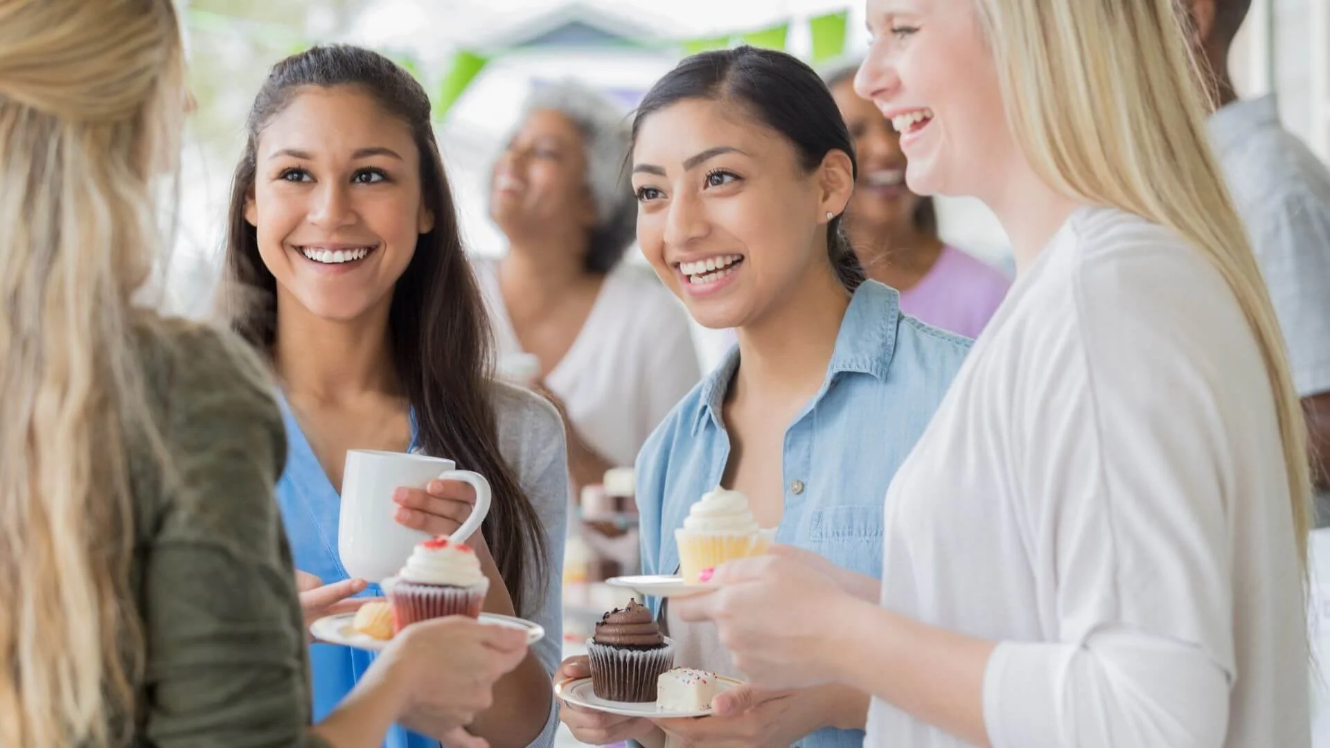 women getting together and eating treats for sel care