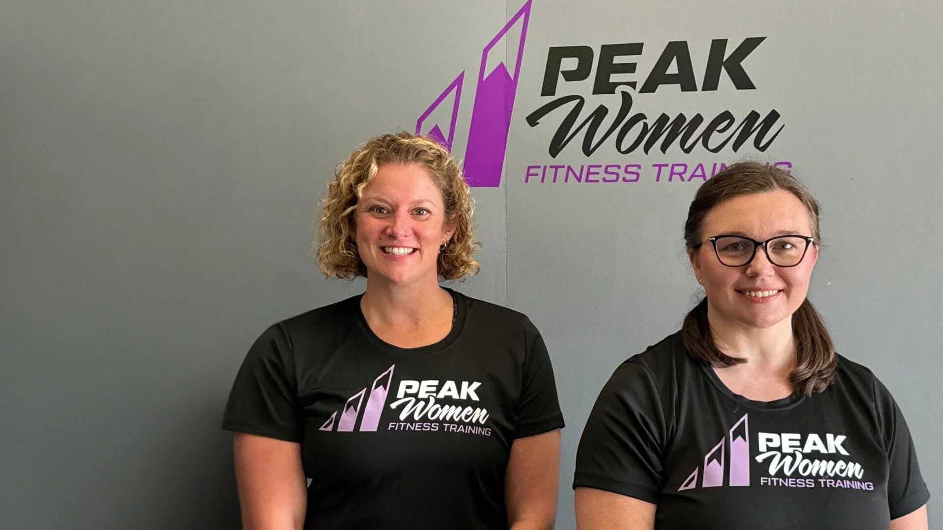 women personal trainers smiling at Peak Women in Troy, MI