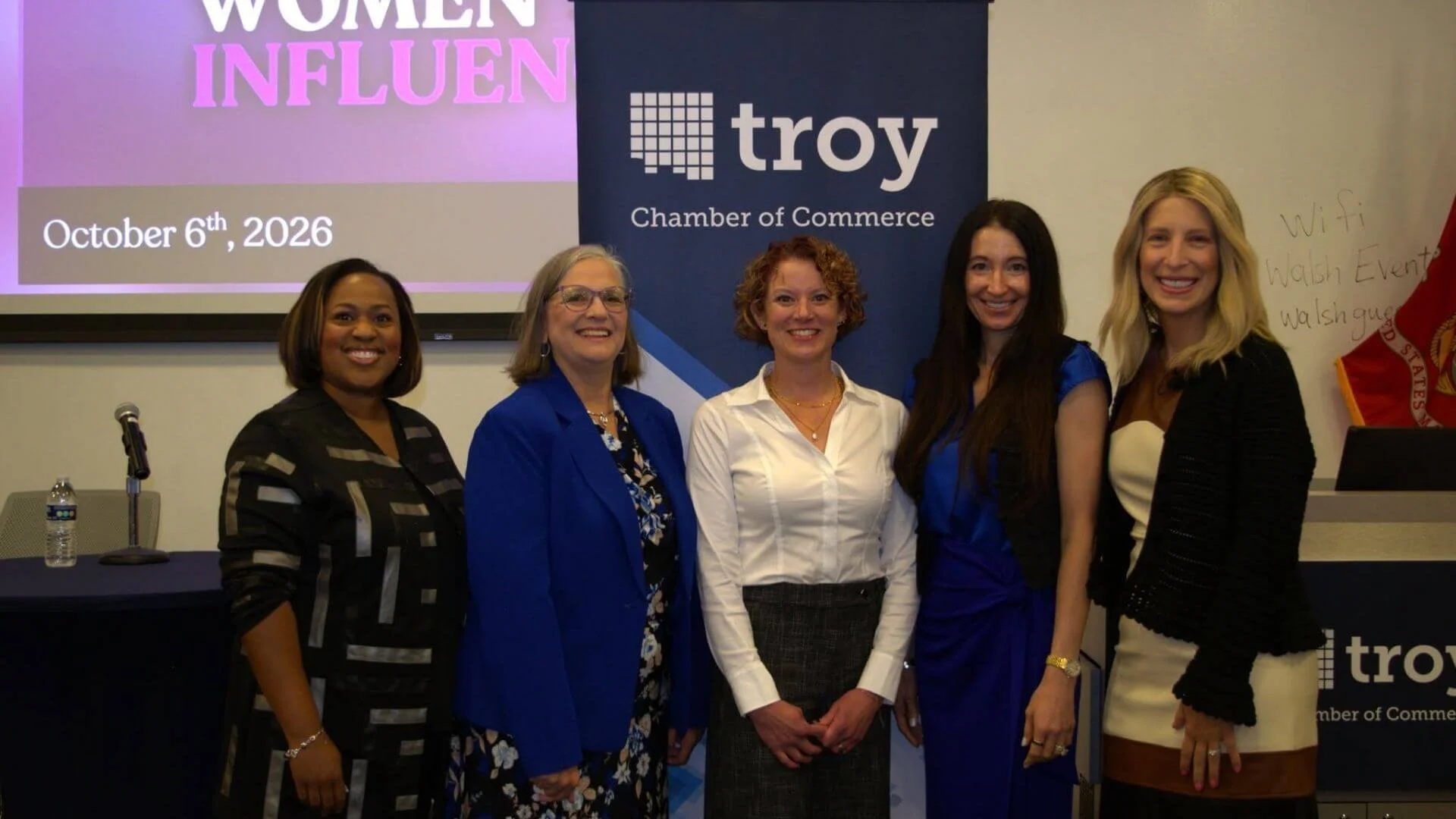 lissa standing with other panelist at event