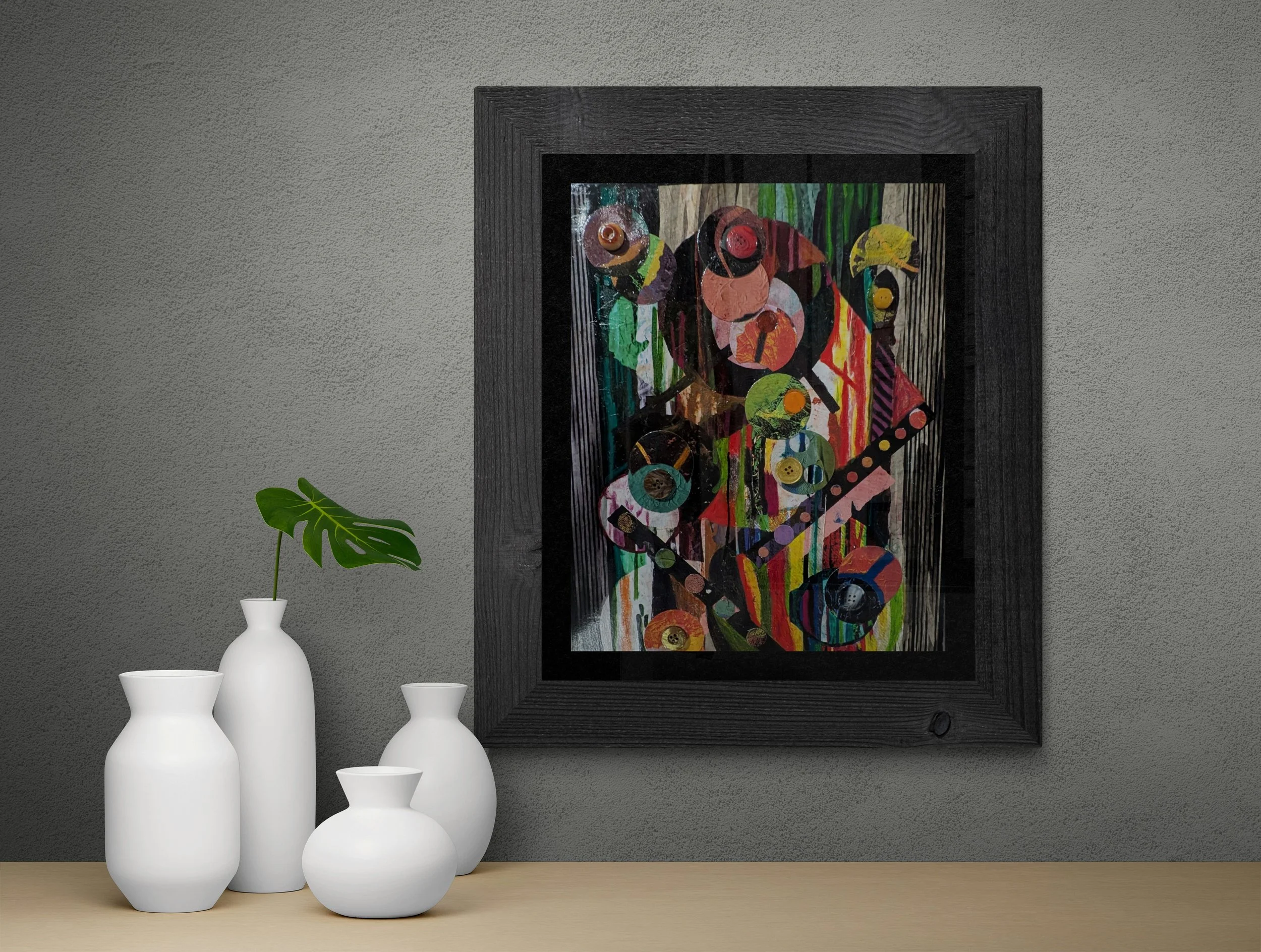 ceramic-vases-and-a-plant-sitting-on-a-shelf (3).jpg