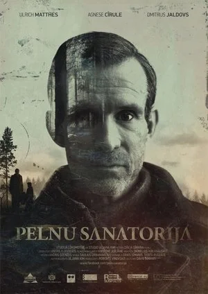 A movie poster featuring a man's face with a double exposure of a forest and trees overlaying his face, promoting the film 'Peln Santaorija'.