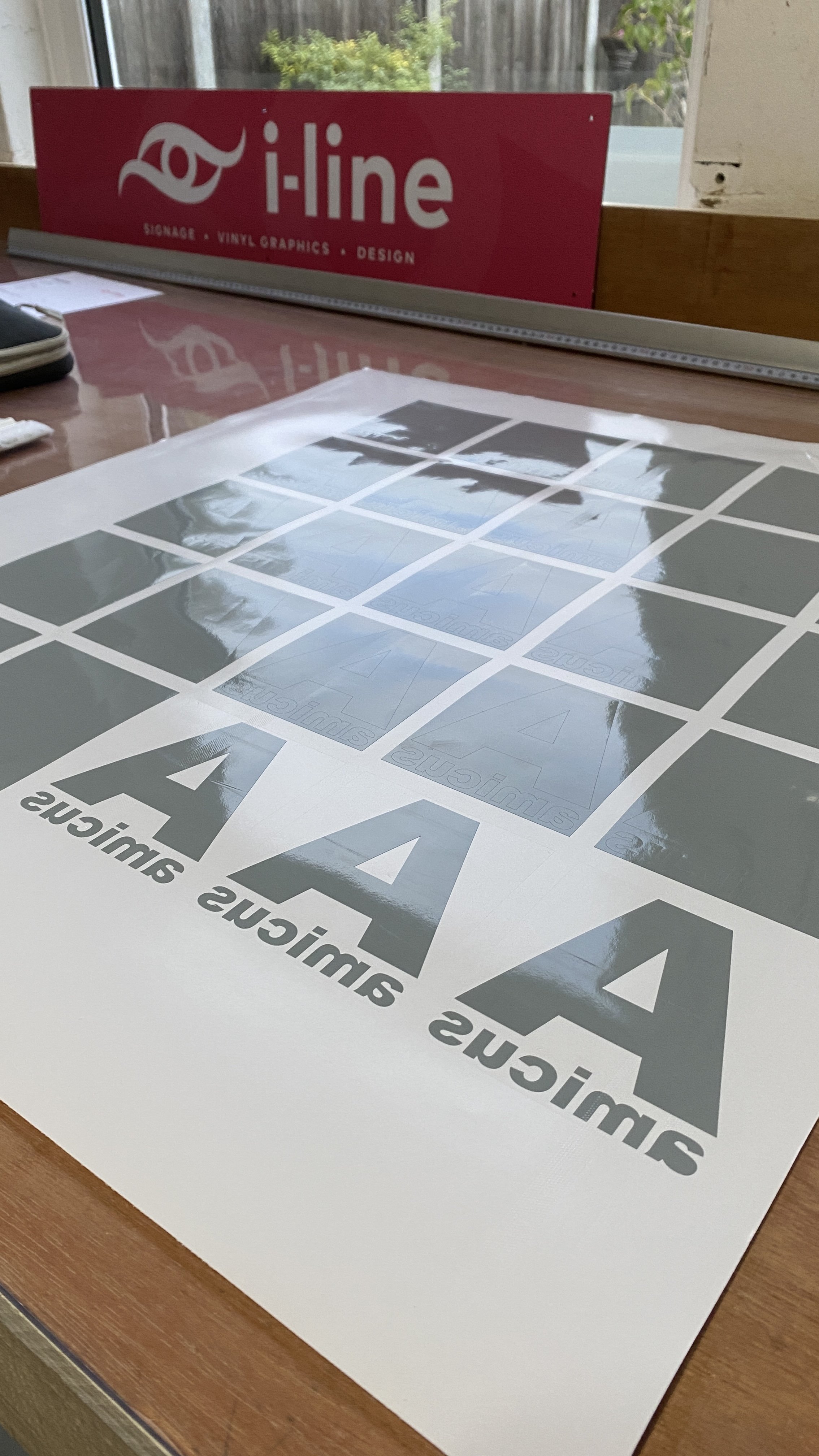 A printed sheet with the text '2WAY' repeated multiple times, designed for application of adhesive vinyl.