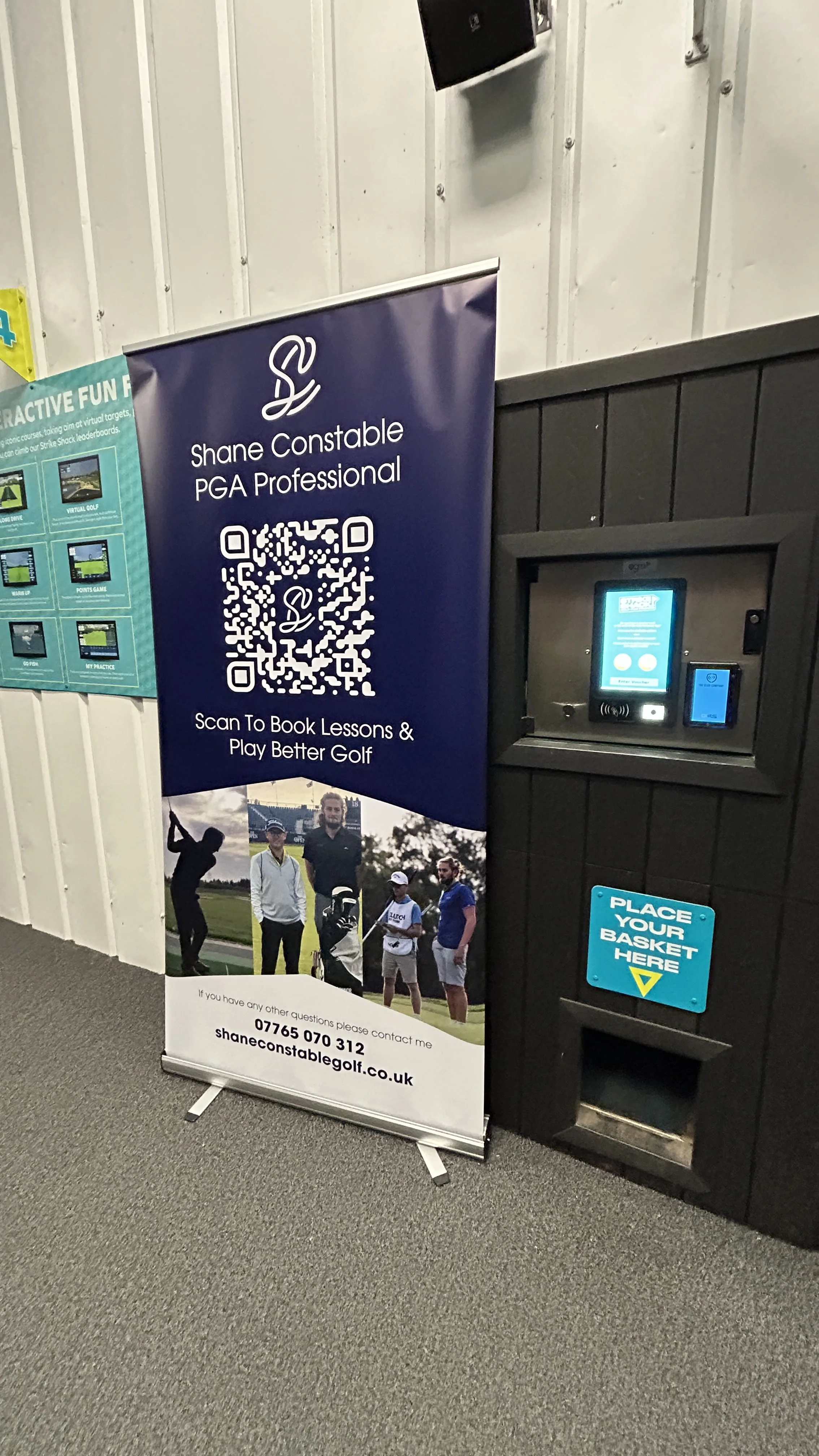A vertical banner displays the name Shane Constable, a PGA professional, with a QR code for booking golf lessons. The banner features a group of people at a golf course and includes contact information, including a phone number and website.