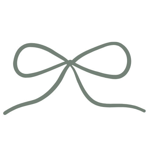 Simple gray knot tied with a piece of ribbon or string on a black background.
