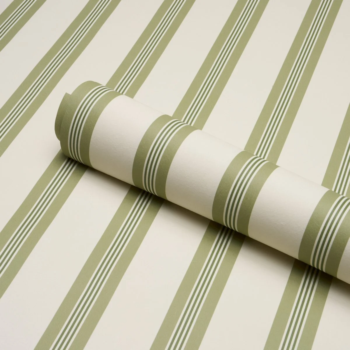 Schumacher Chatham Stripe wallpaper in Leaf, green and cream stripe roll