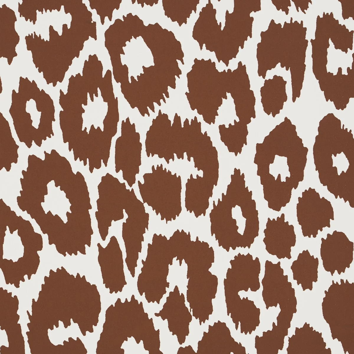 Close view of Schumacher Iconic Leopard Brown spots on a cream ground