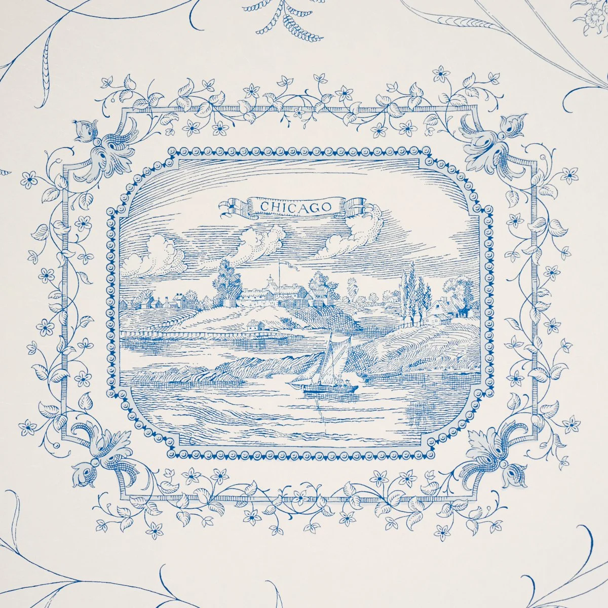 Close-up of Schumacher Century Scenic Toile Blue showing the Chicago vignette and floral frame, SKU 5018411