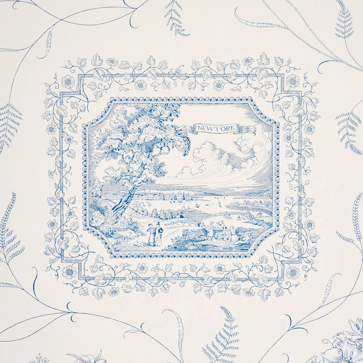 Close-up of Schumacher Century Scenic Toile Blue showing the framed New York vignette and floral border, SKU 5018411