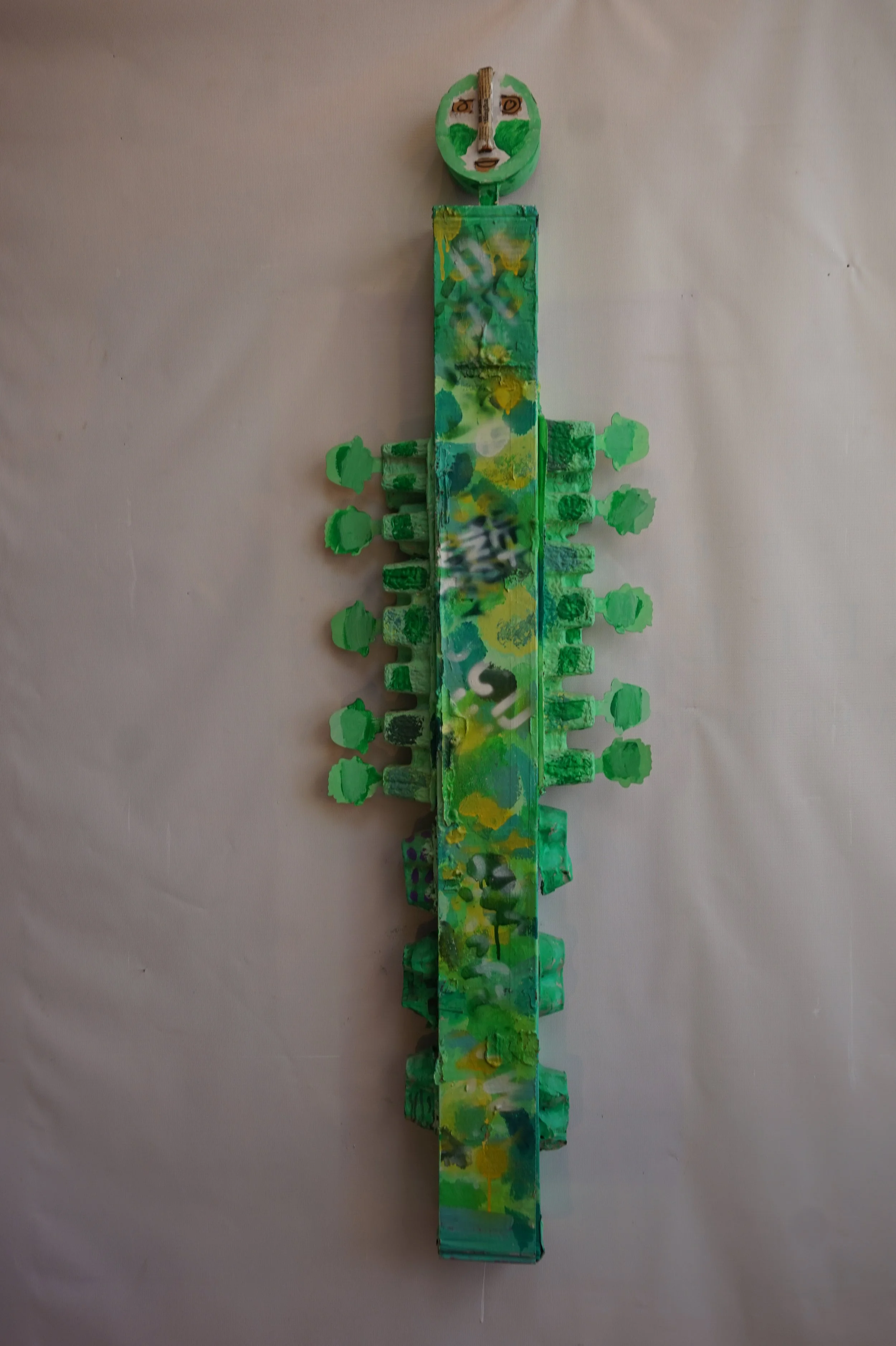 45. green cardboard figure.JPG
