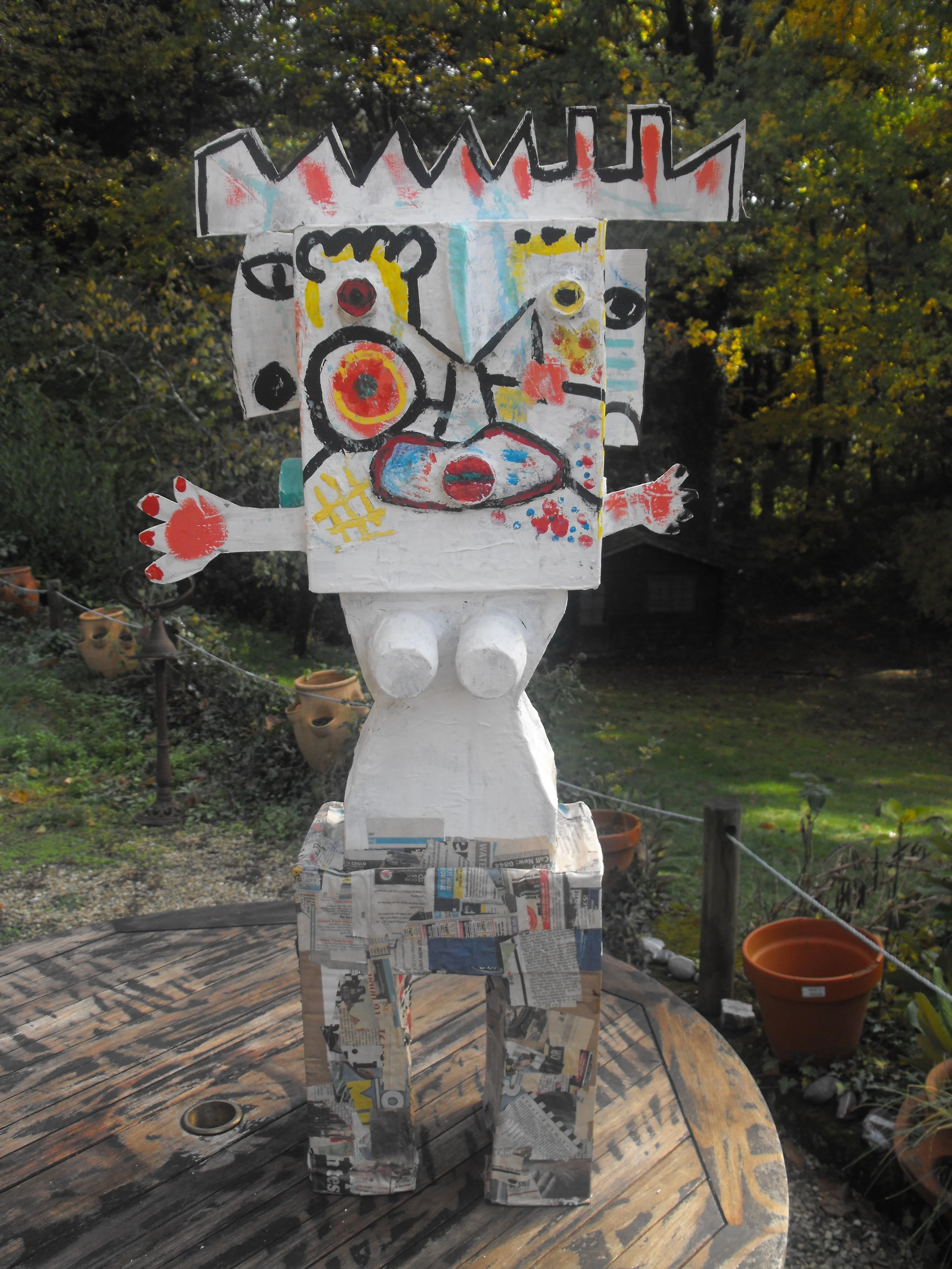 48. figure in garden.paint ,card and paper..JPG