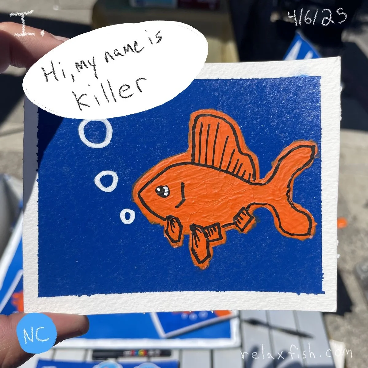 A drawing of a bright orange fish with spiky dorsal fin and tail, with a smiling face and an eye that looks shiny. The fish appears to be wearing a bowtie and accessory, against a blue background with three white bubbles. There is a white speech bubb