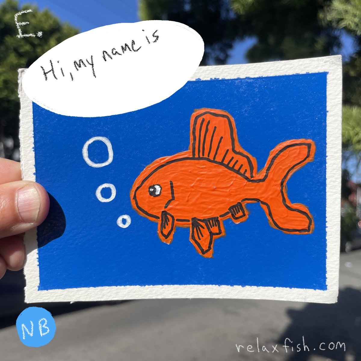 Hand holding a blue card with an orange fish illustration, speech bubble saying 'Hi, my name is', and the website relaxfish.com.