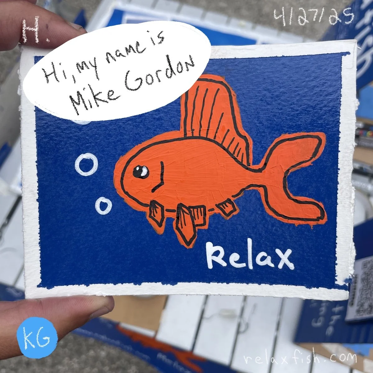 A colorful drawing of an orange fish with black outlines, swimming with bubbles in a blue background. The word 'relax' is written at the bottom, and a speech bubble says, 'Hi, my name is Mike Gordon.'
