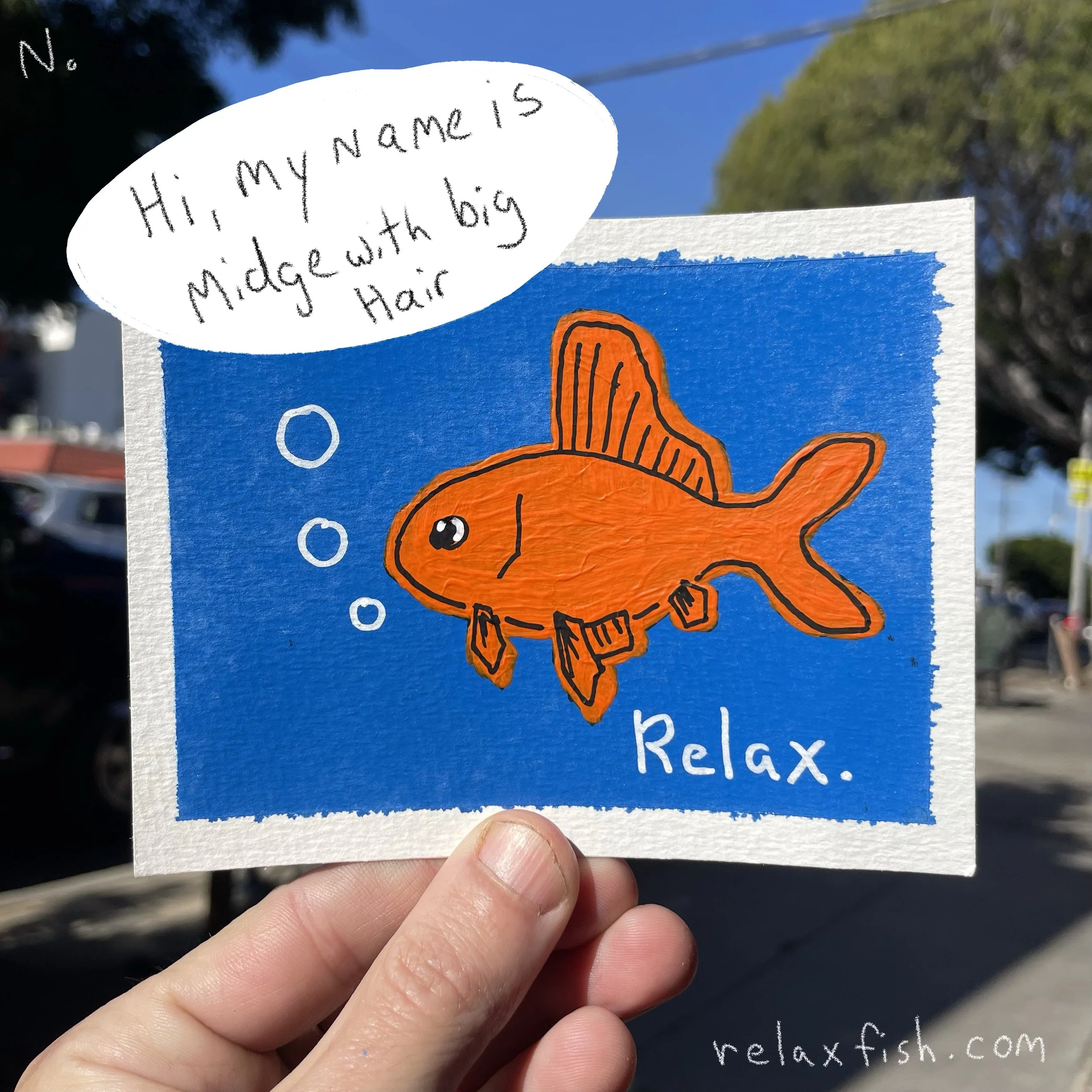 A colorful drawing of an orange fish with a big dorsal fin, wearing a collar, with bubbles coming from its mouth, on a bright blue background. Handwritten text says, 'Hi, my name is Midge with big hair,' and the word 'Relax.' is written below. The dr