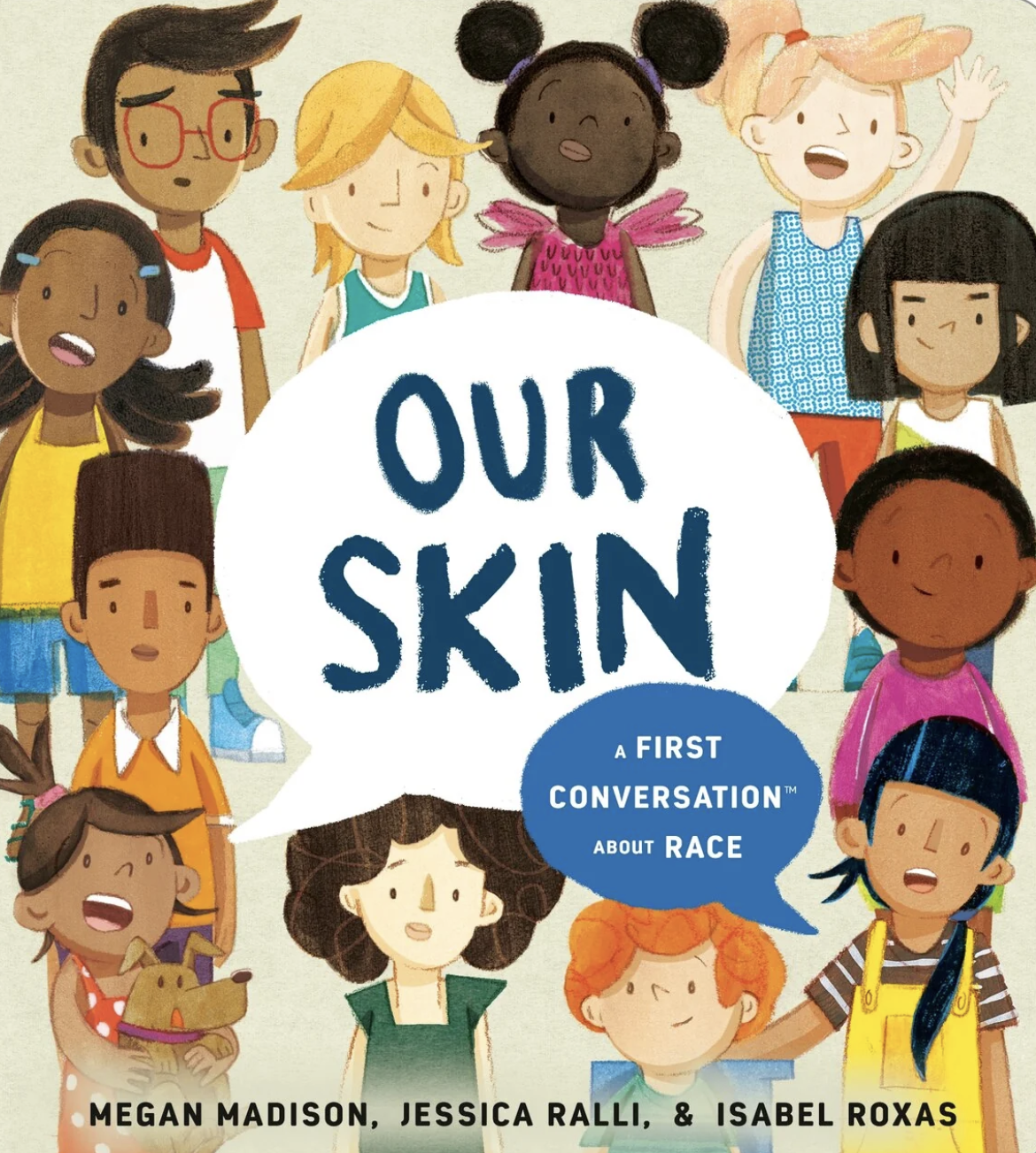 Cover of the children's book titled 'Our Skin: A First Conversation About Race' by Megan Madison, Jessica Ralli, and Isabel Roxas. The cover features diverse children with different skin tones and hair types, smiling and standing together.