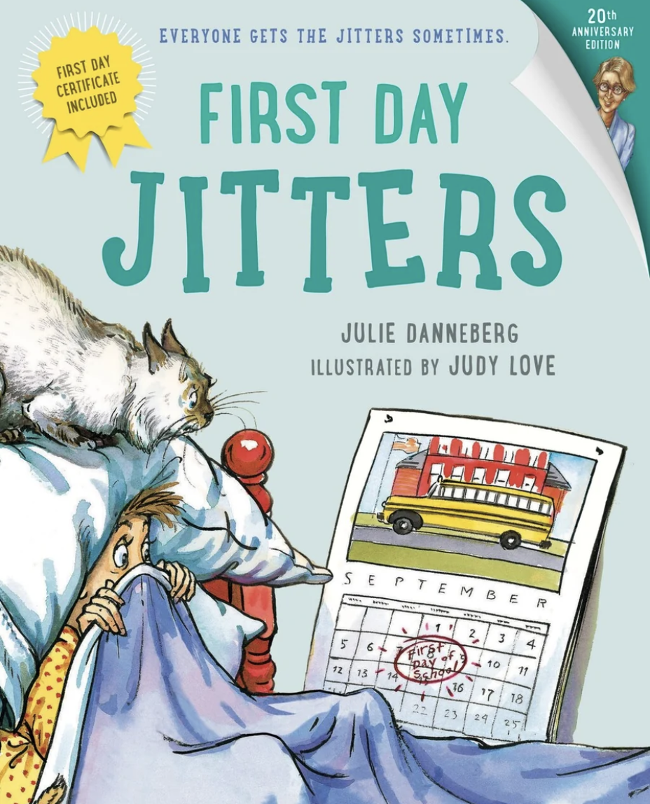 Cover of the book titled 'First Day Jitters' by Julie Dannerberg, illustrated by Judy Love, celebrating its 20th anniversary edition. The cover features a person in bed with a worried expression, holding a blanket, a calendar showing September with the words 'First Day of School' circled, a yellow school bus, and a cat lying beside a red lamp.