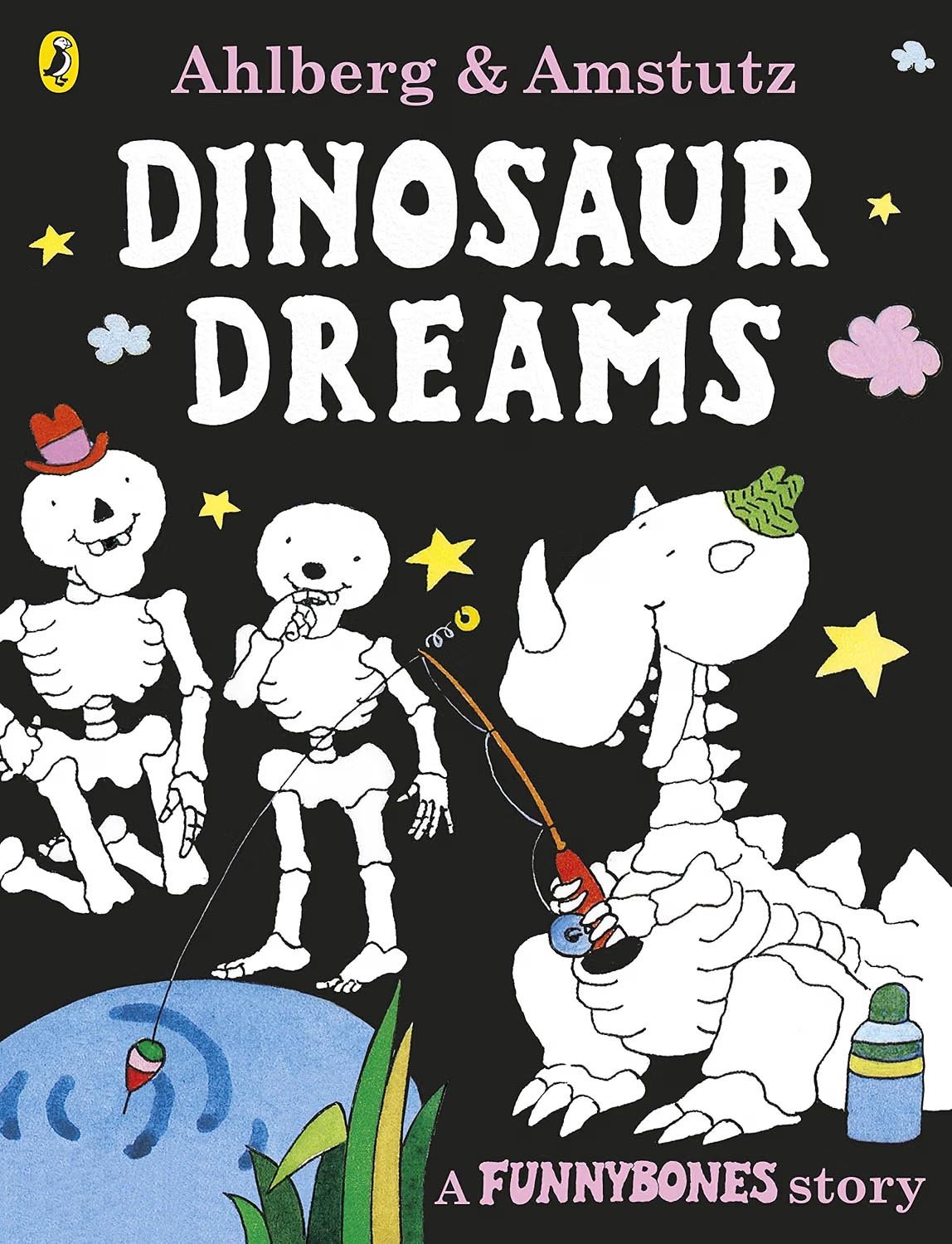The cover of a children's book titled "Dinosaur Dreams" by Ahlberg & Amstutz, part of the Funnybones story series. The cover features cartoon skeletons of dinosaurs and bones, some holding fishing rods, with colorful clouds, stars, and a small pond with a fish.