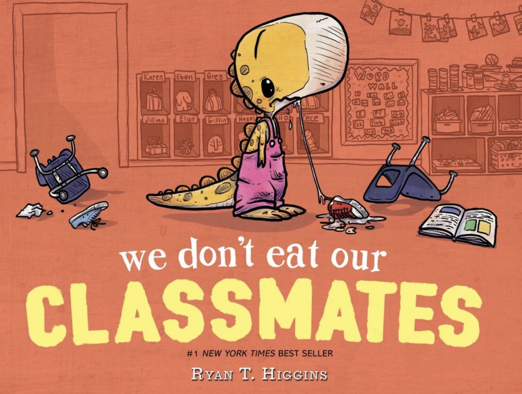 Illustration of a cartoon dinosaur with a large head and tail, standing in a cluttered classroom or playroom, with trash and scattered books around. The background shows cubbies labeled with children's names, a word wall, and shelves with books and toys. The dinosaur appears sad and is dripping water or tears, with the headline 'we don't eat our CLASSMATES' and the author's name, Ryan T. Higgins.