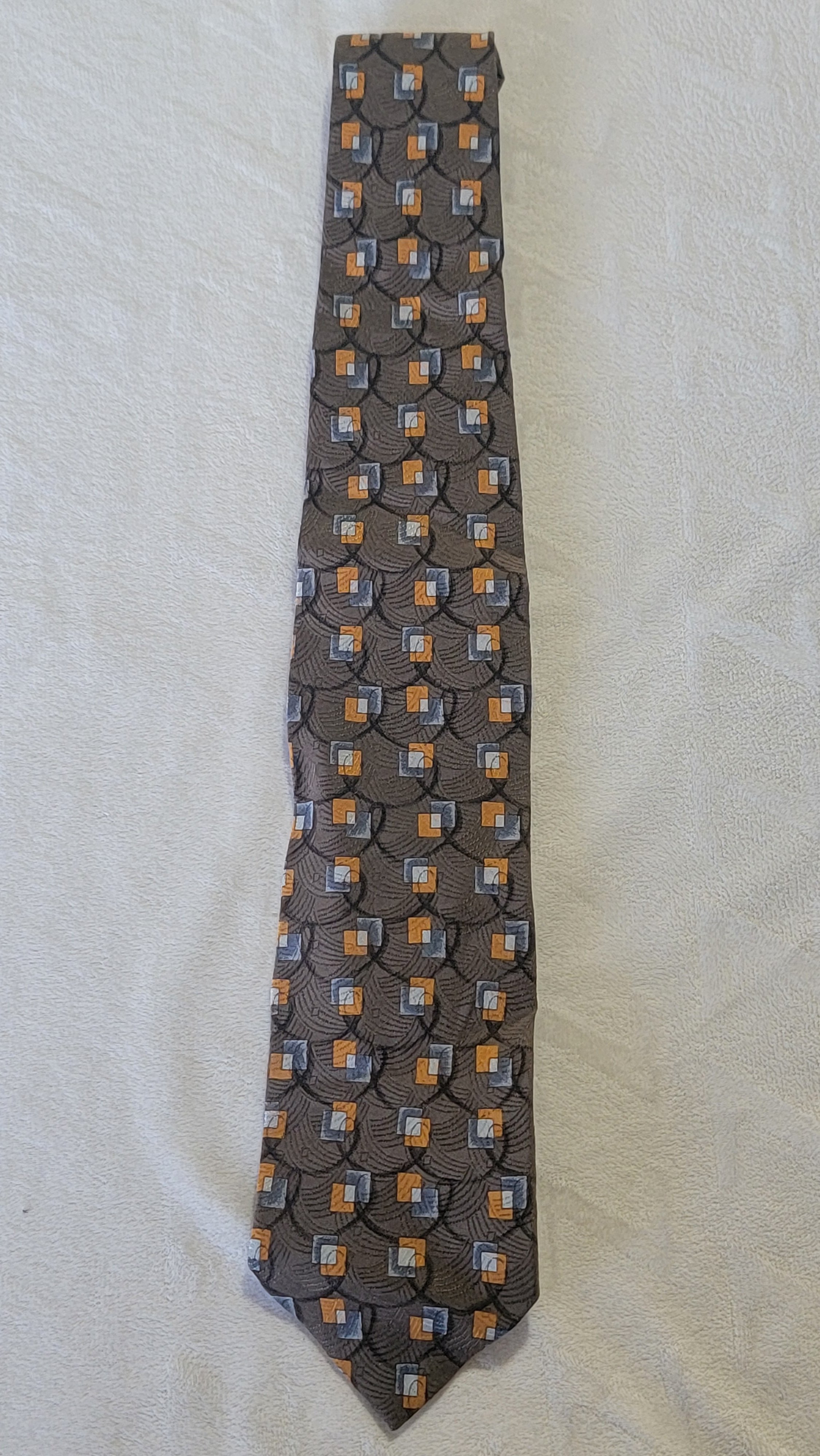 Brown Tie and Gold and blue box tie