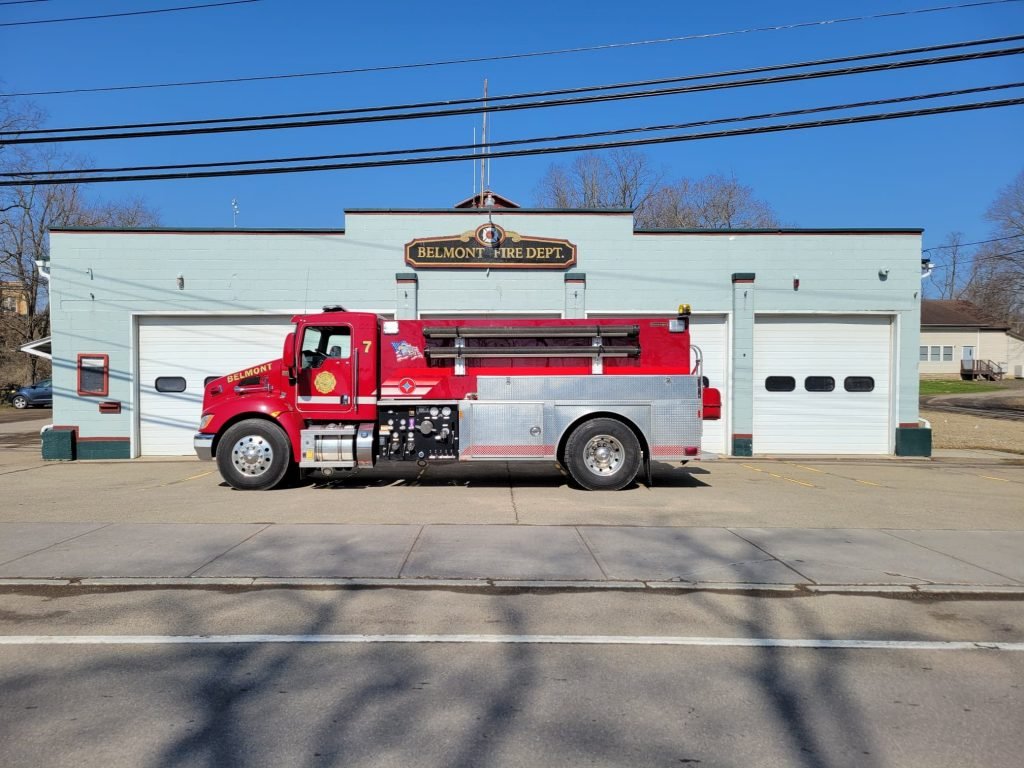  2012 Crimson Kenworth Tanker 
 
2-man cab with a 500 GPM Pump and a 2000 Gal Tank
 
​This is the second due truck for structure fires in the town. This truck carries a 2000 gallon porta tank, 250 GPM trash pump, 2 speed lays both are 150’ of 1.75” h