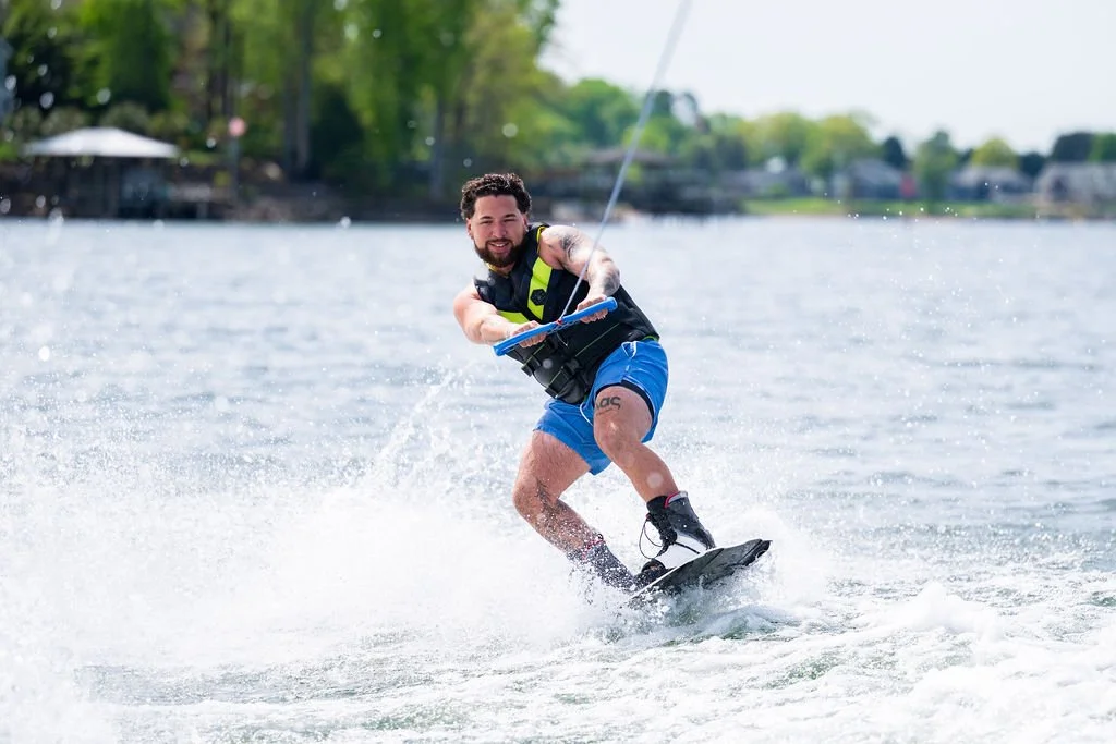 Man wakeboarding with Surf Wake Ski on Lake Norman