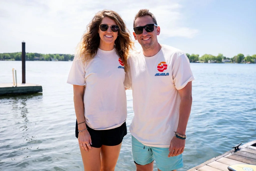 Tim & Audrey, founders of Surf Wake Ski, stand on the dock at Holiday Marina at Lake Norman, NC.