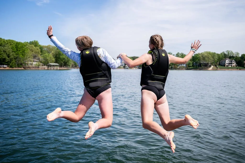 Two girls enjoying Summer Camp with Surf Wake Ski in North Carolina.