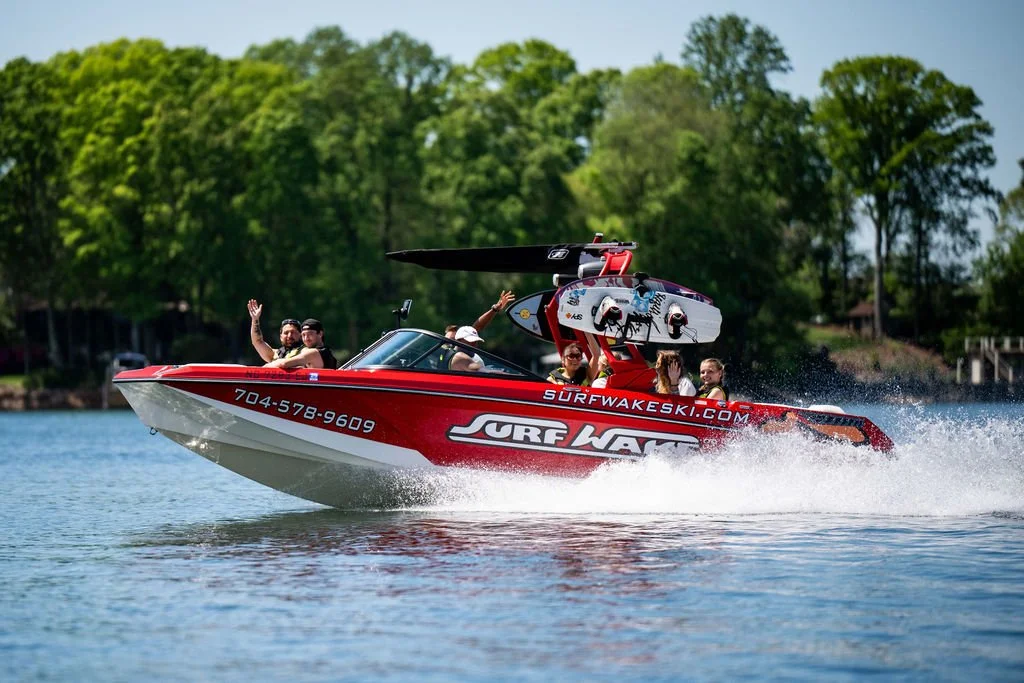 Surf Wake Ski boat with group of students on Lake Norman, NC