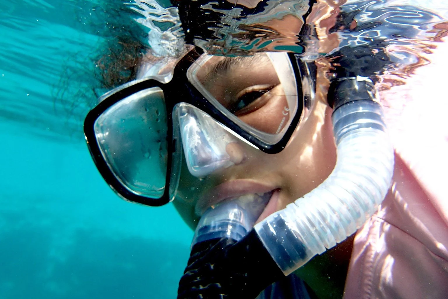 Close up of camper's face snorkeling in the spring