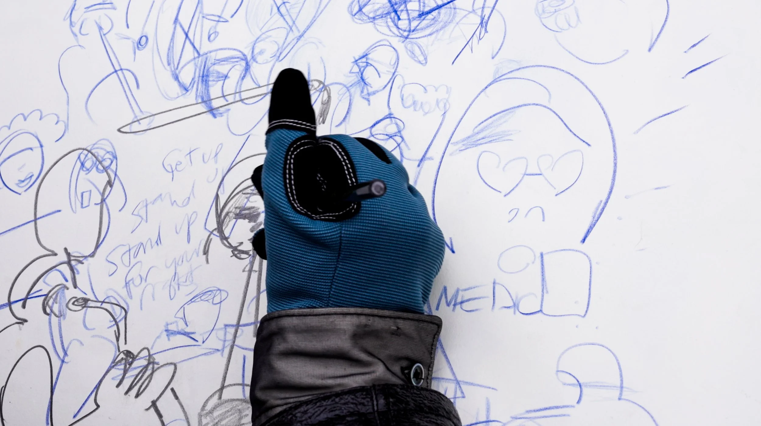 Izzy Hand On Pen Working.jpg