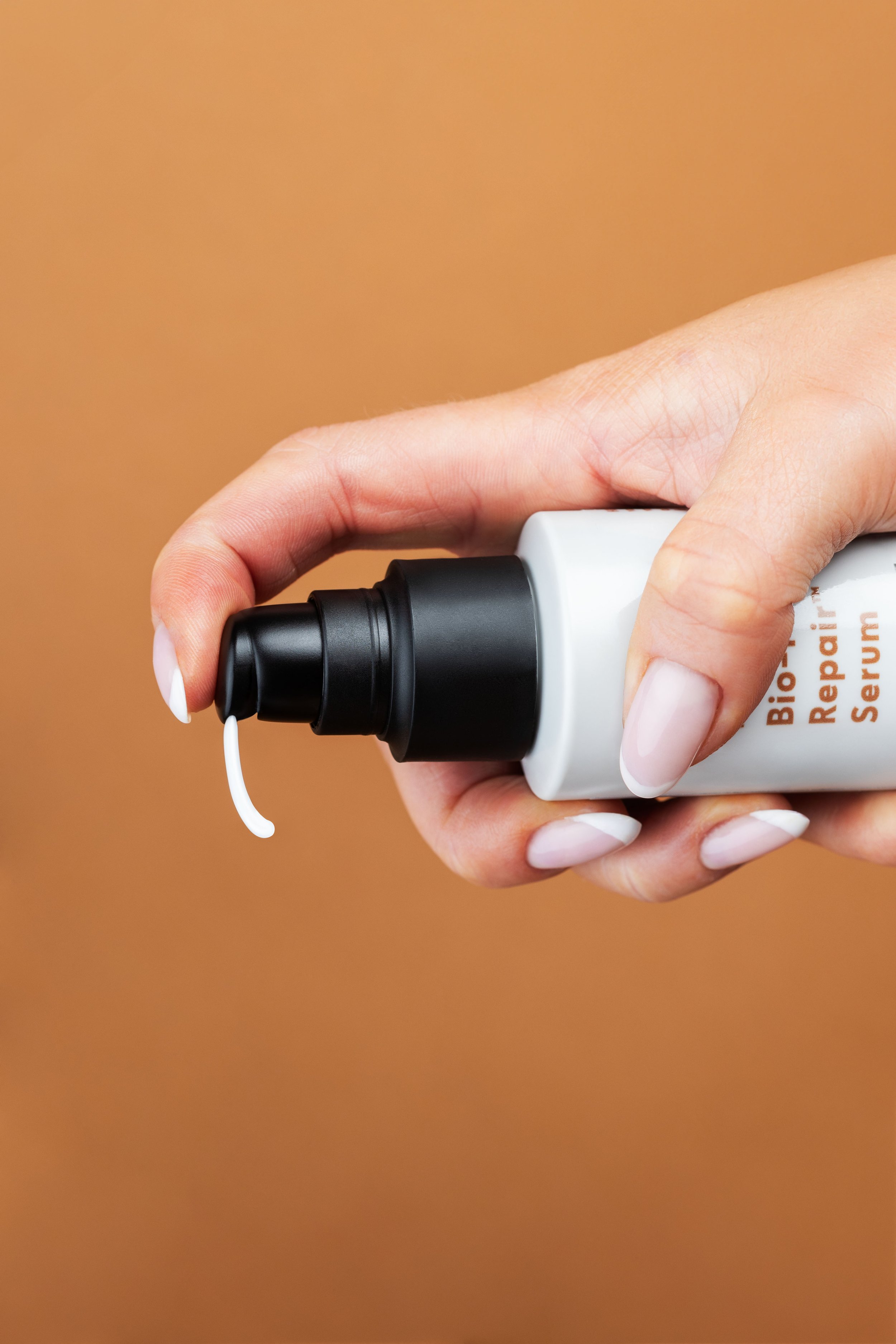 BMR_serum_bottle_hands_2024_2 copy.jpg