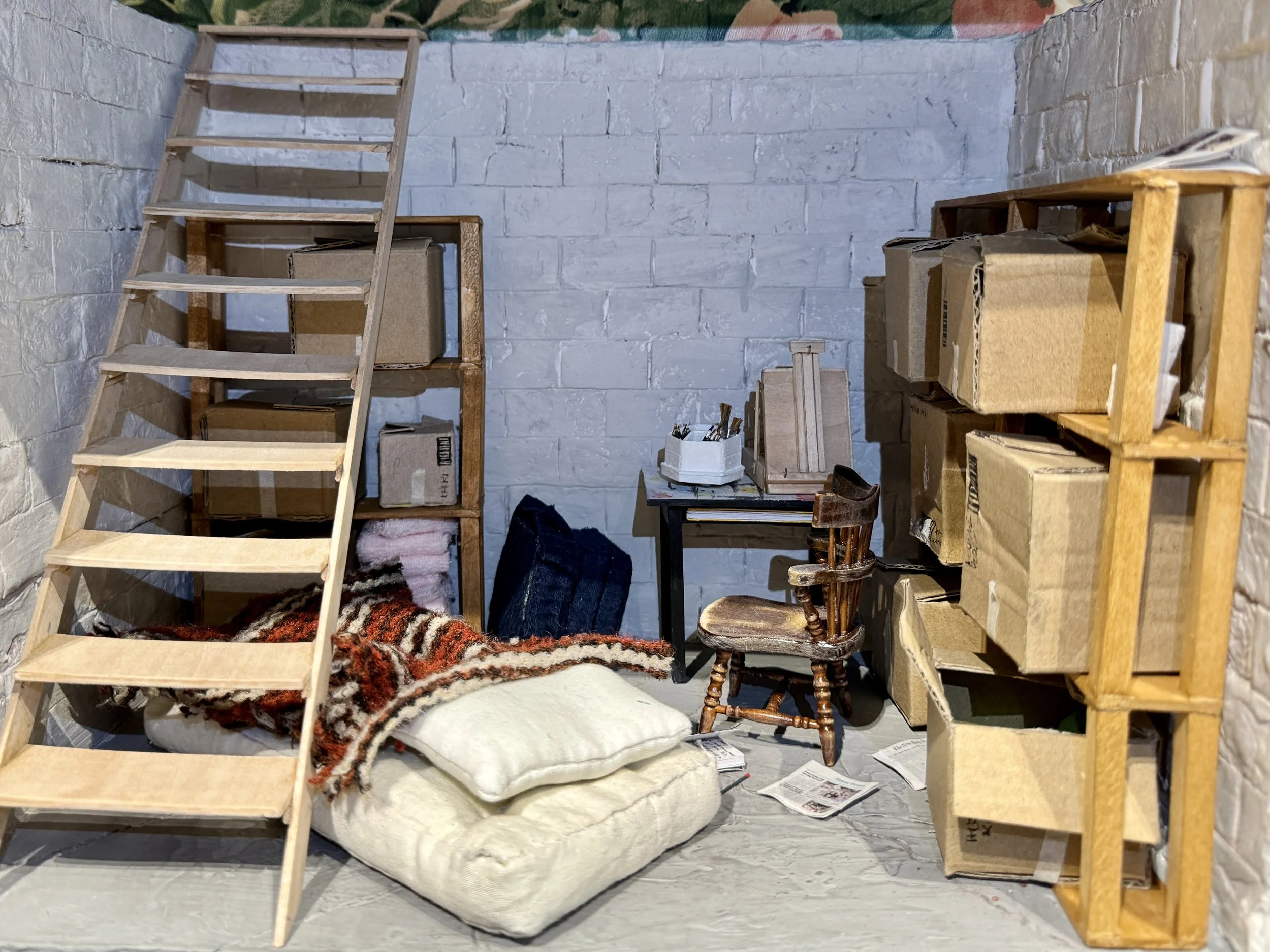 Balsa wood, acrylic paint, wood glue, found fabric, toilet paper, wood stain, foam, sewing pins, whittled toothpicks, tin foil, paintbrush hairs, cardboard, floral wire, craft wire, masking tape, paper clay, vellum, modified found objects