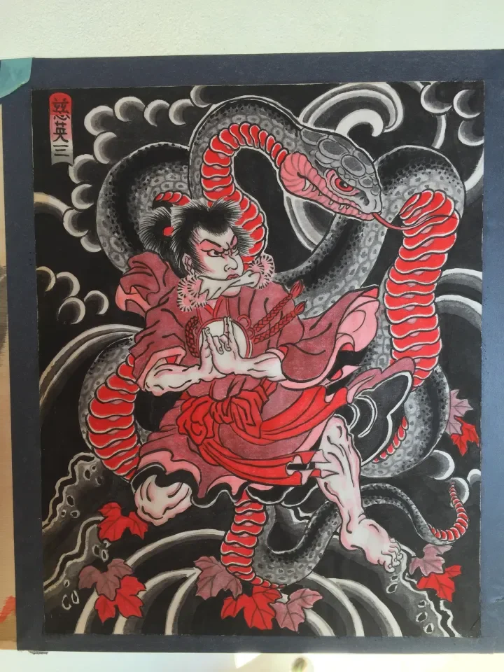A traditional Japanese-style artwork depicting a fierce warrior with a snake wrapped around him, set against a black background with swirling patterns and red maple leaves.
