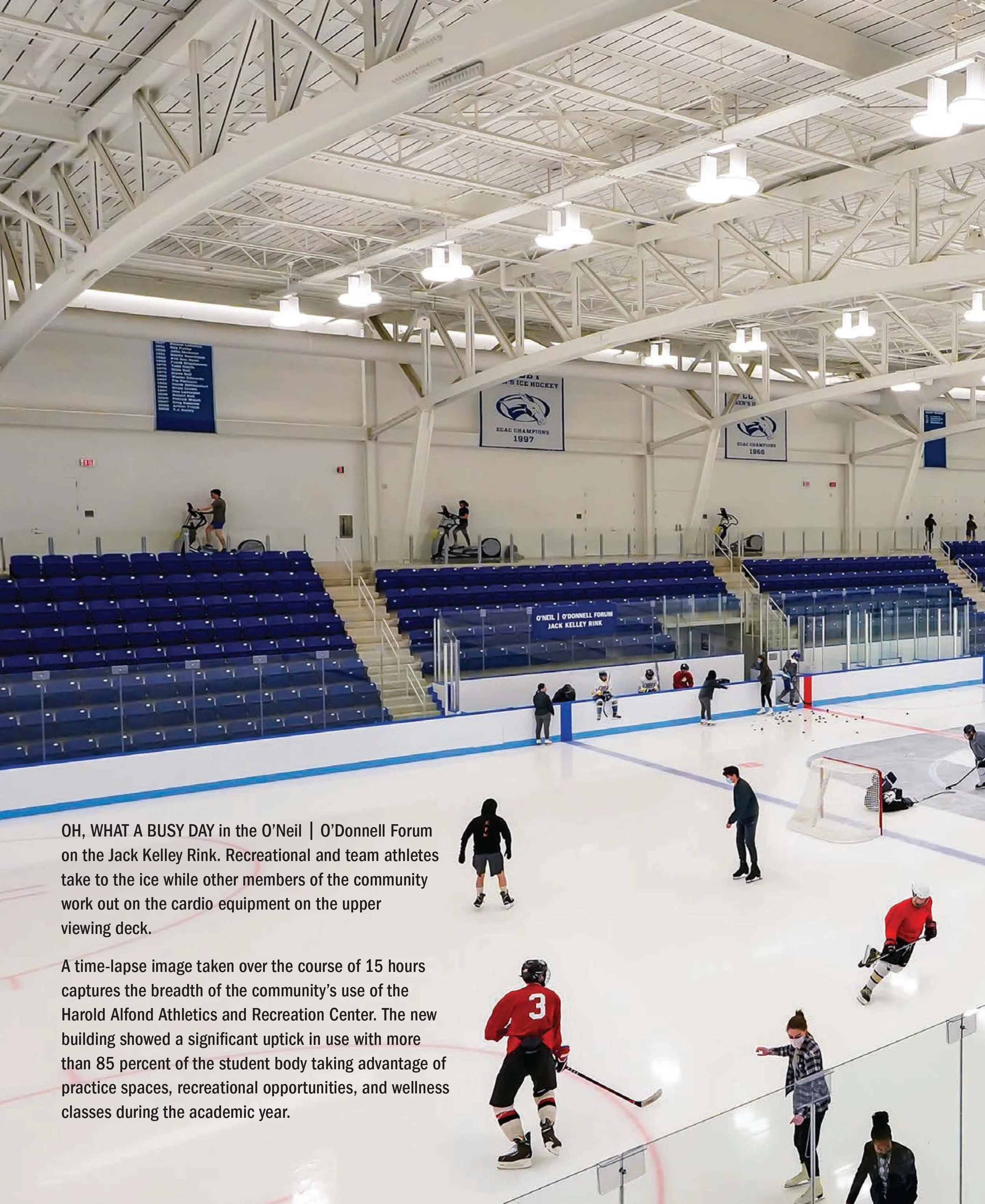 Ice hockey rink at O'Neil O'Donnell Forum with players, coaches, and community members practicing and working out on the ice. Bleachers and cardio equipment are visible in the background.