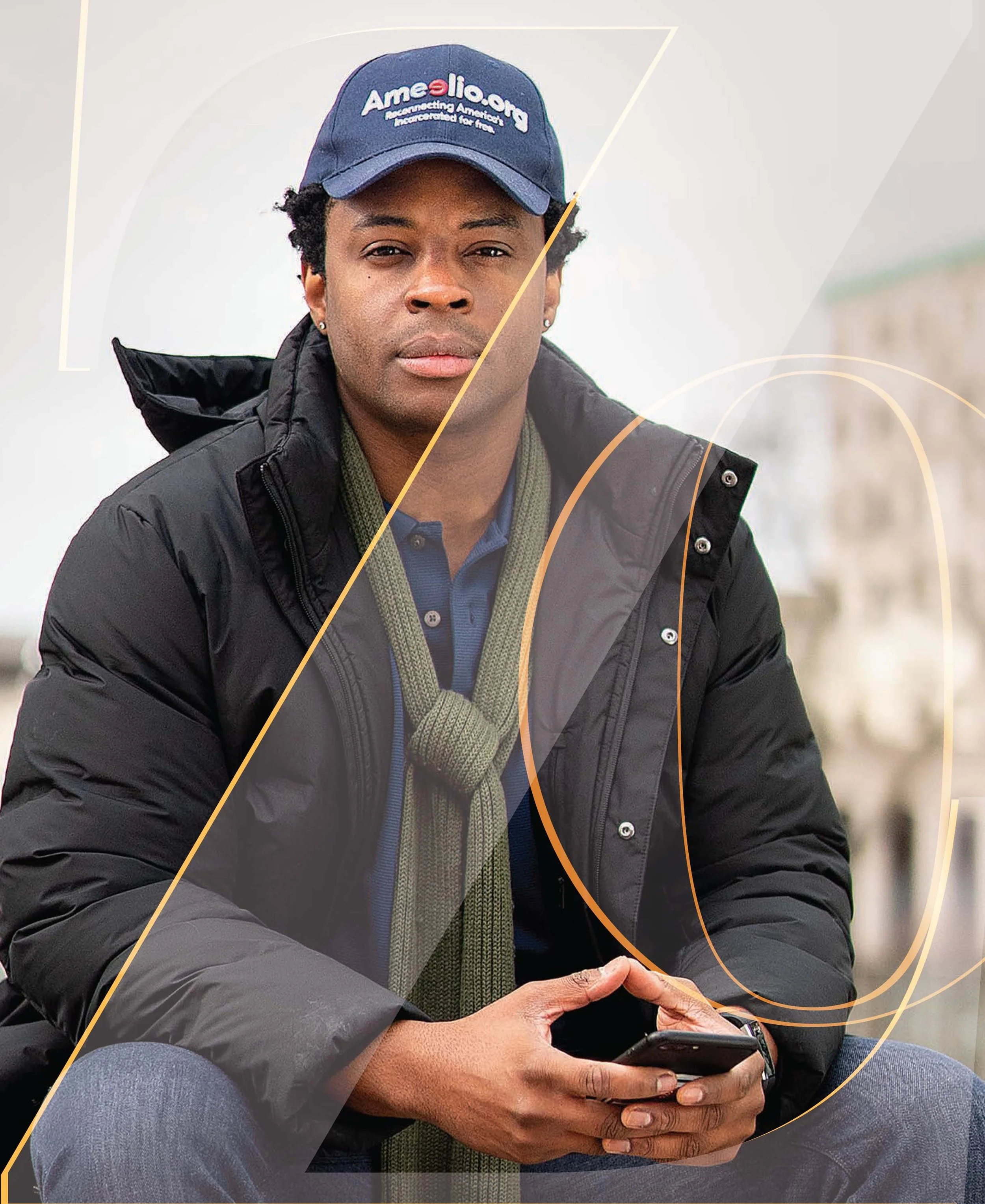 A man wearing a blue cap with the logo 'Ame s ilo.org' and text 'Incarcerated for free' sits outside, holding a phone.