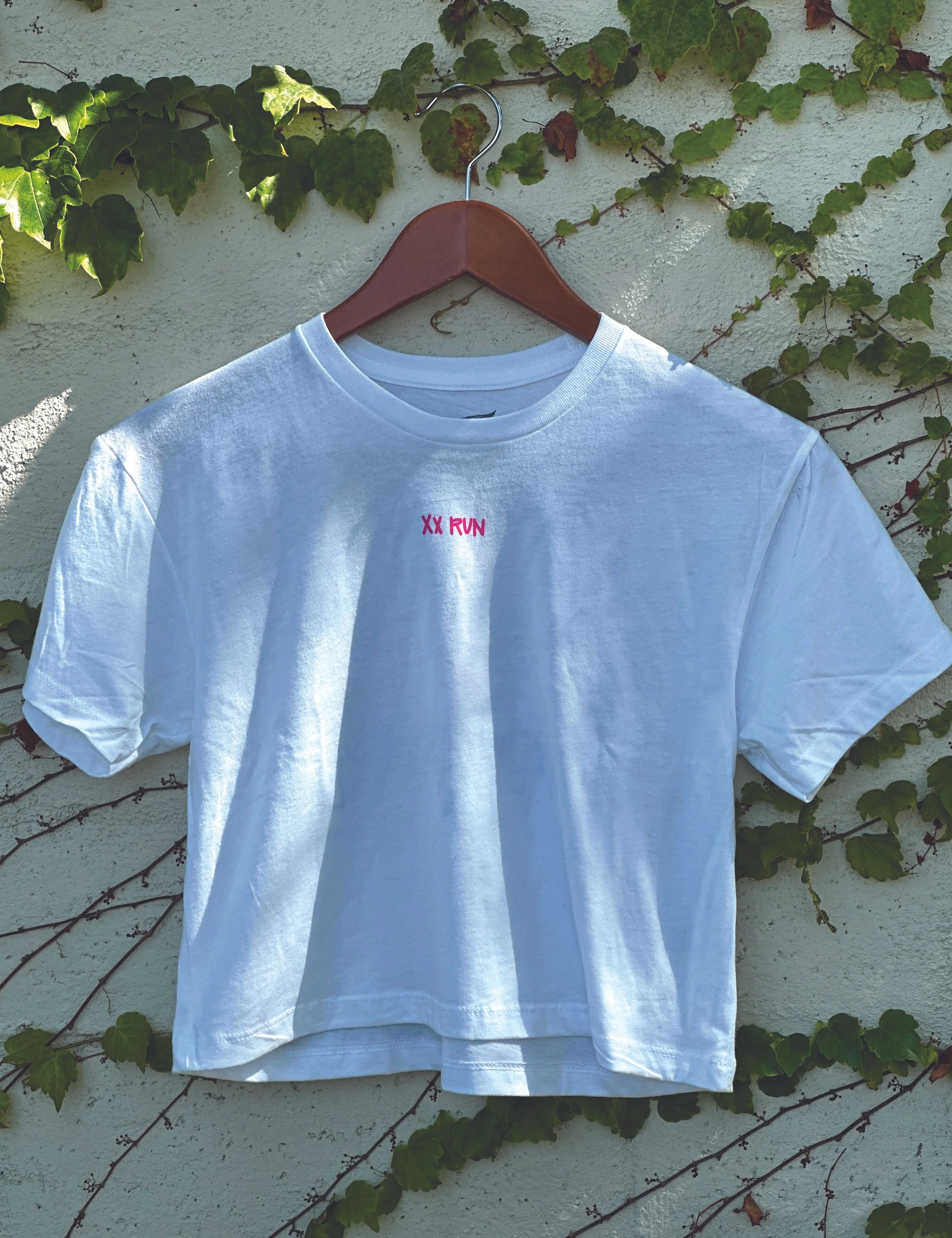 Women Run the World Cropped T - front of shirt displayed - Nomad Running Tribe