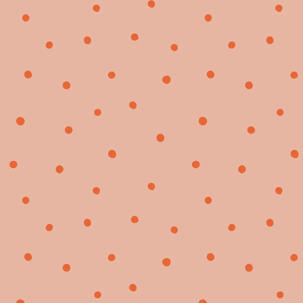 Pink background with scattered orange dots