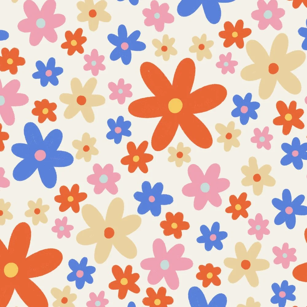 Pattern of various colorful flowers in pink, blue, beige, and orange on a cream background.