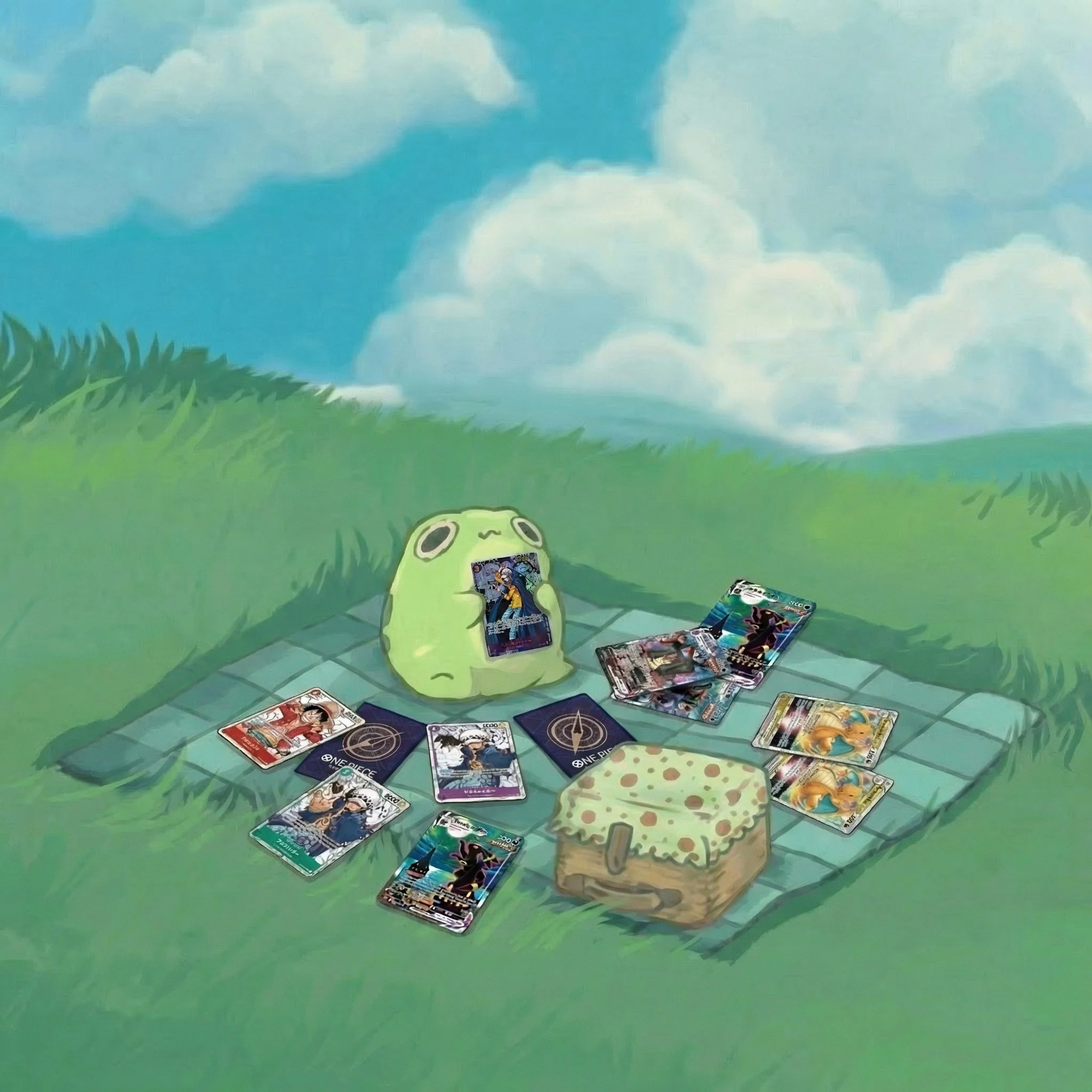 A Pokémon-themed card game setup on a grassy field with a blue sky and clouds background. There are trading cards spread out, a small green Pokémon plush, a pizza box, and a green Pokémon plush with a card in its mouth.