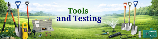 A display of tools and testing equipment on a grassy field with trees and mountains in the background, including shovels, a seed planter, and testing devices.