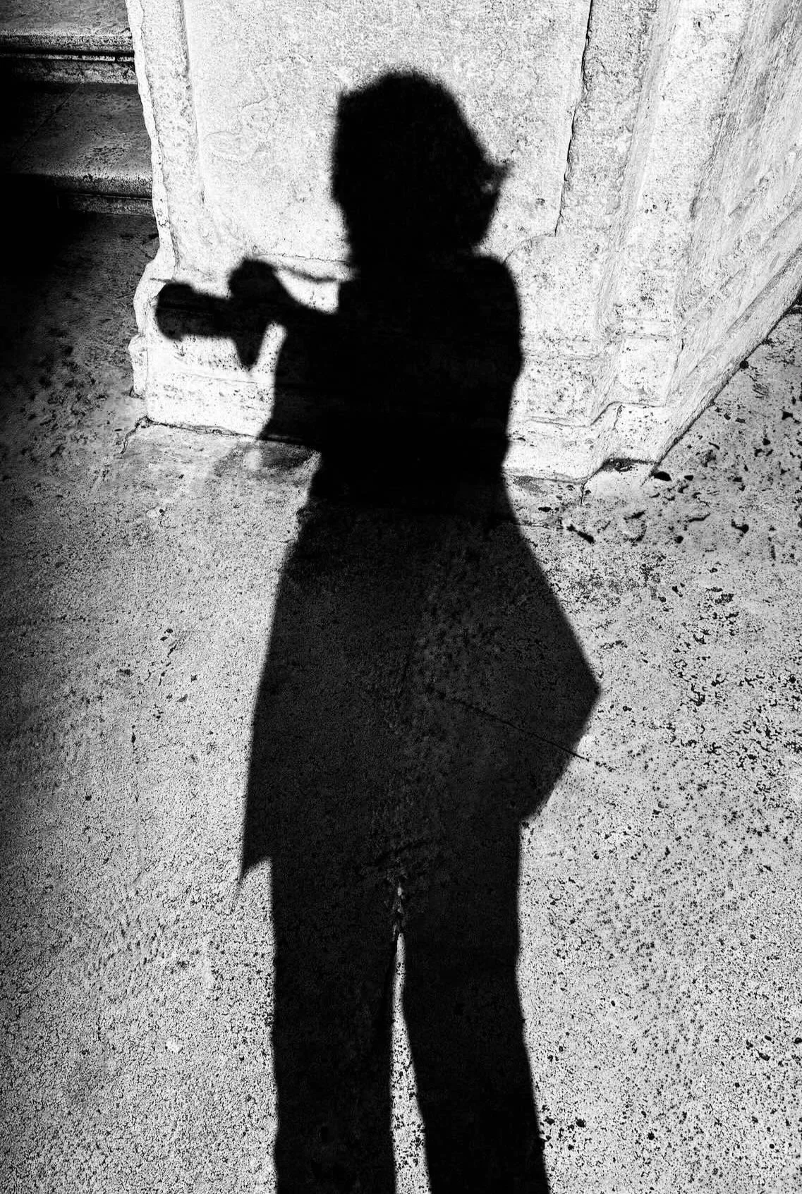 Black and white shadow self portrait of Donna Lancia.