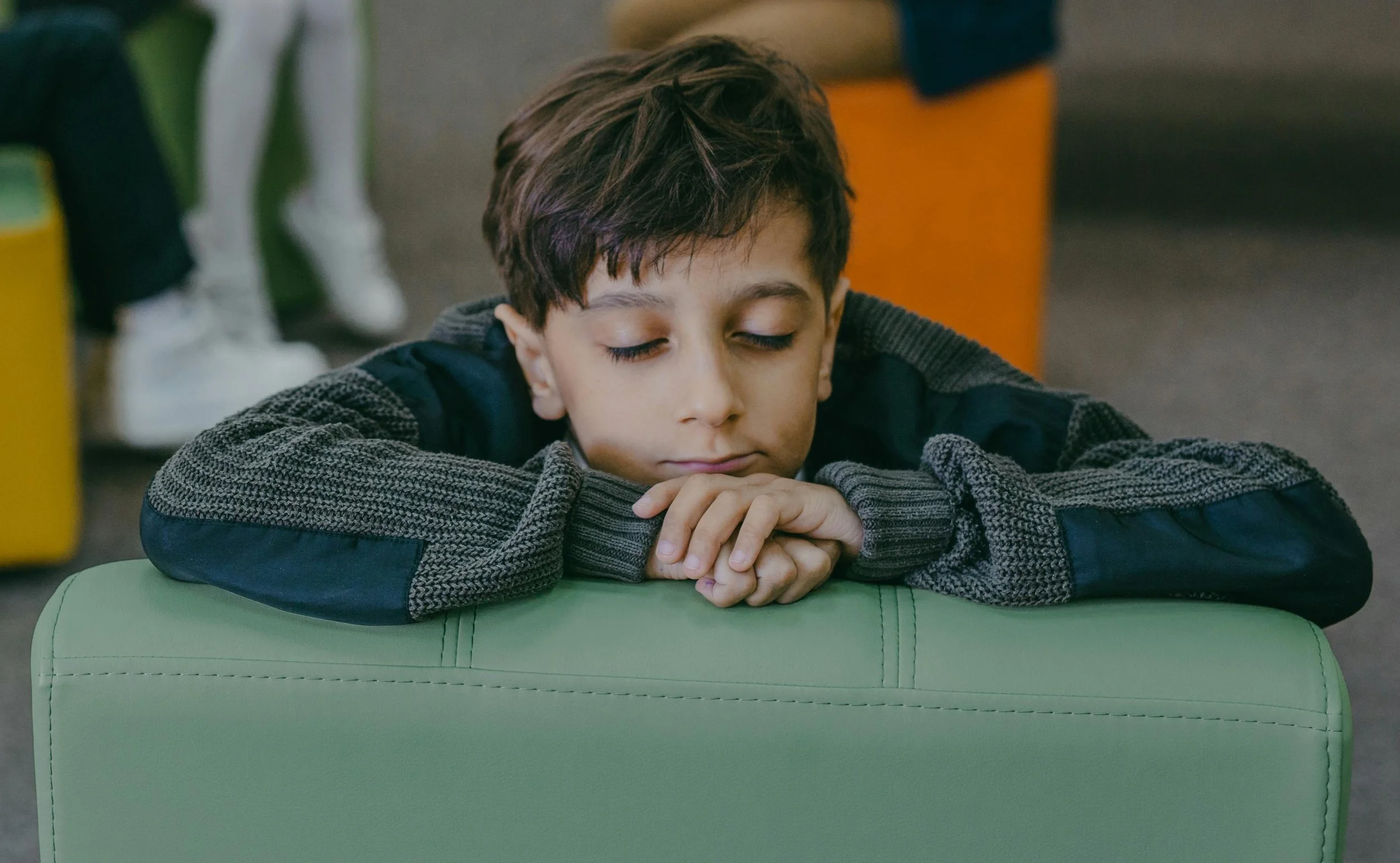 bored child in therapy session struggling with motivation