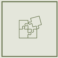 Four puzzle pieces assembled to form a square on a light background.