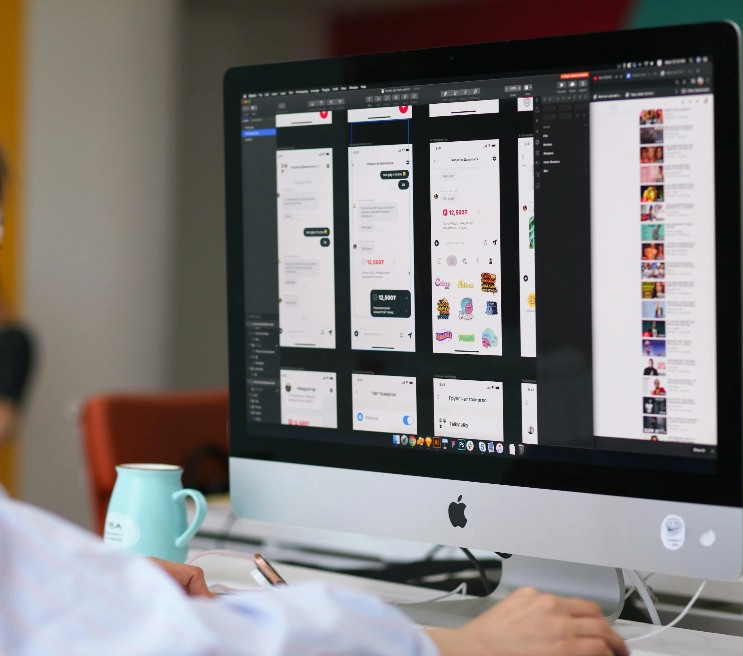 Designer creating user interface concepts on an iMac as part of the creative design process at PMDN Creative.