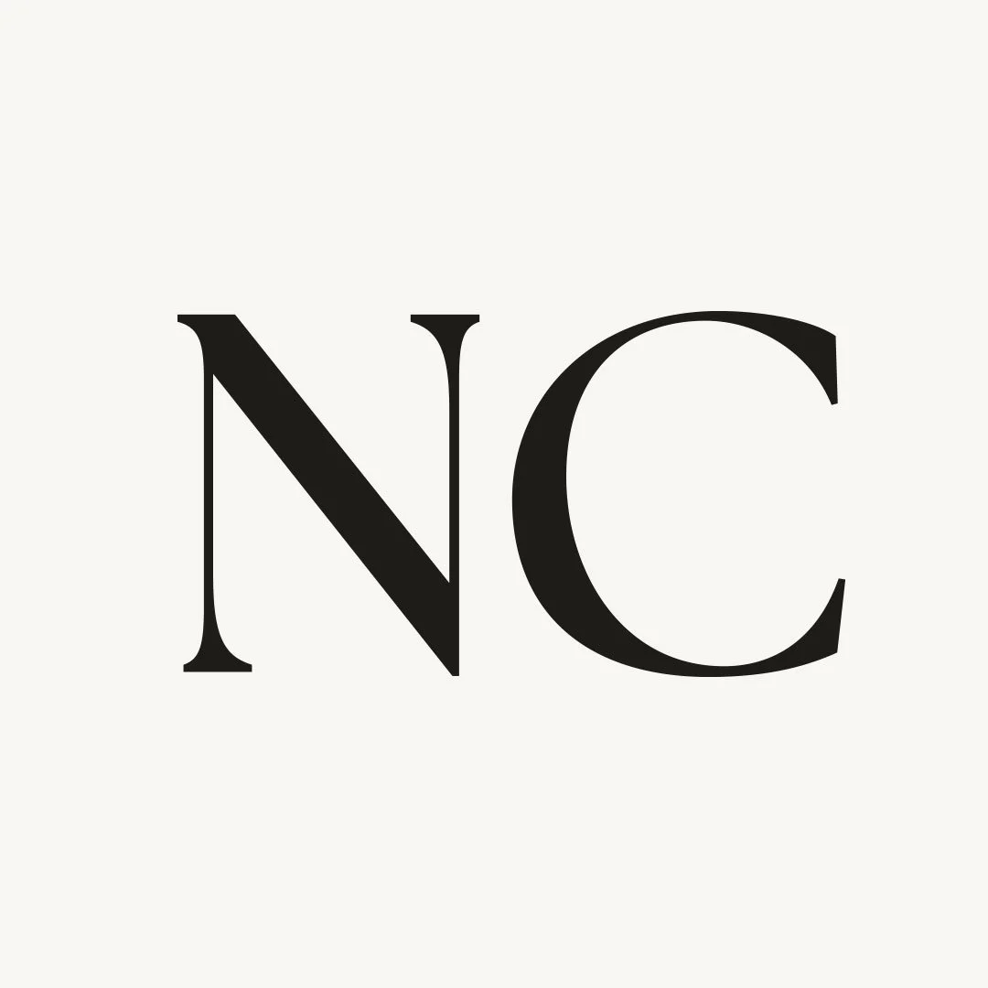 Black initials 'NC' on a white background