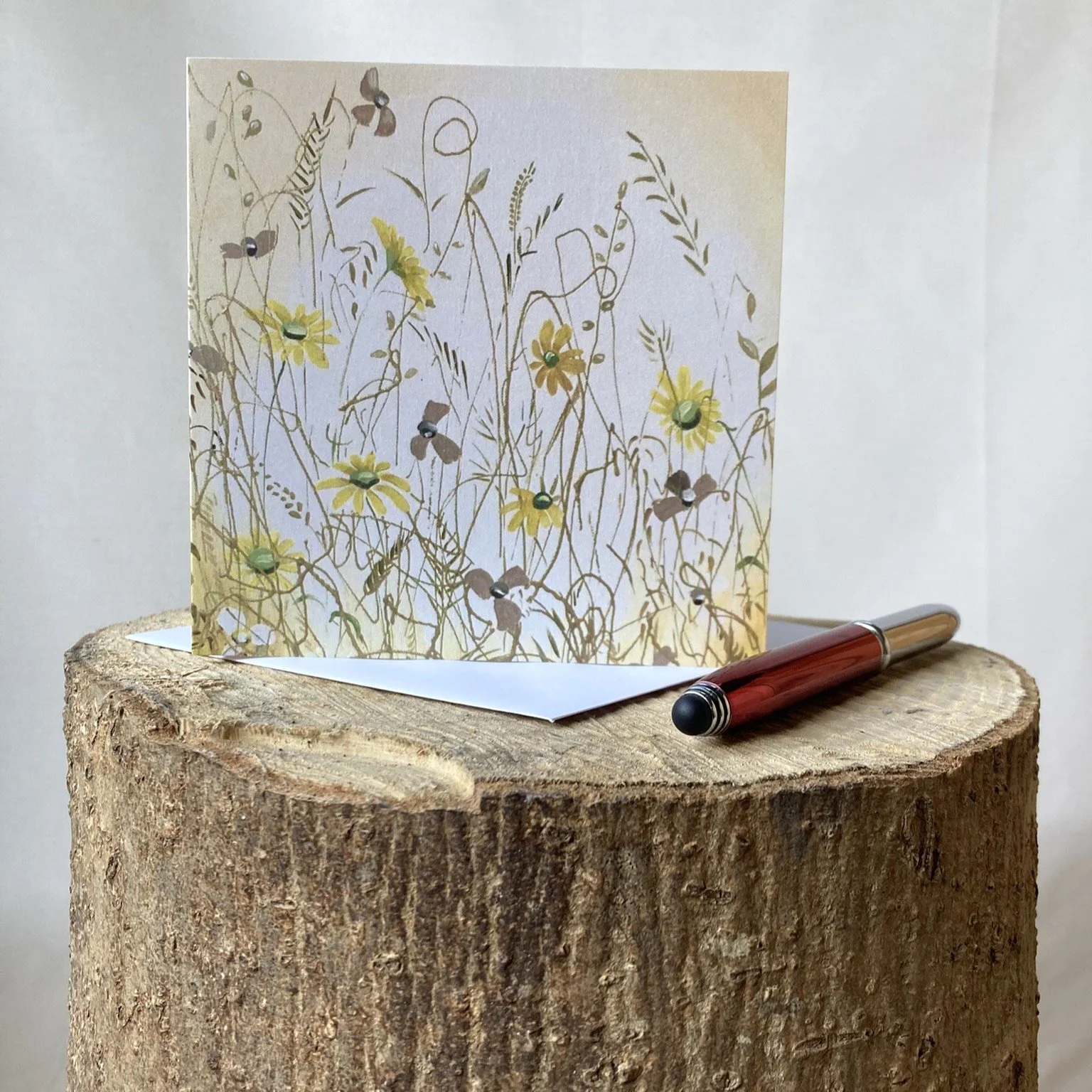 greetings card with floral meadow in yellow tones.JPEG