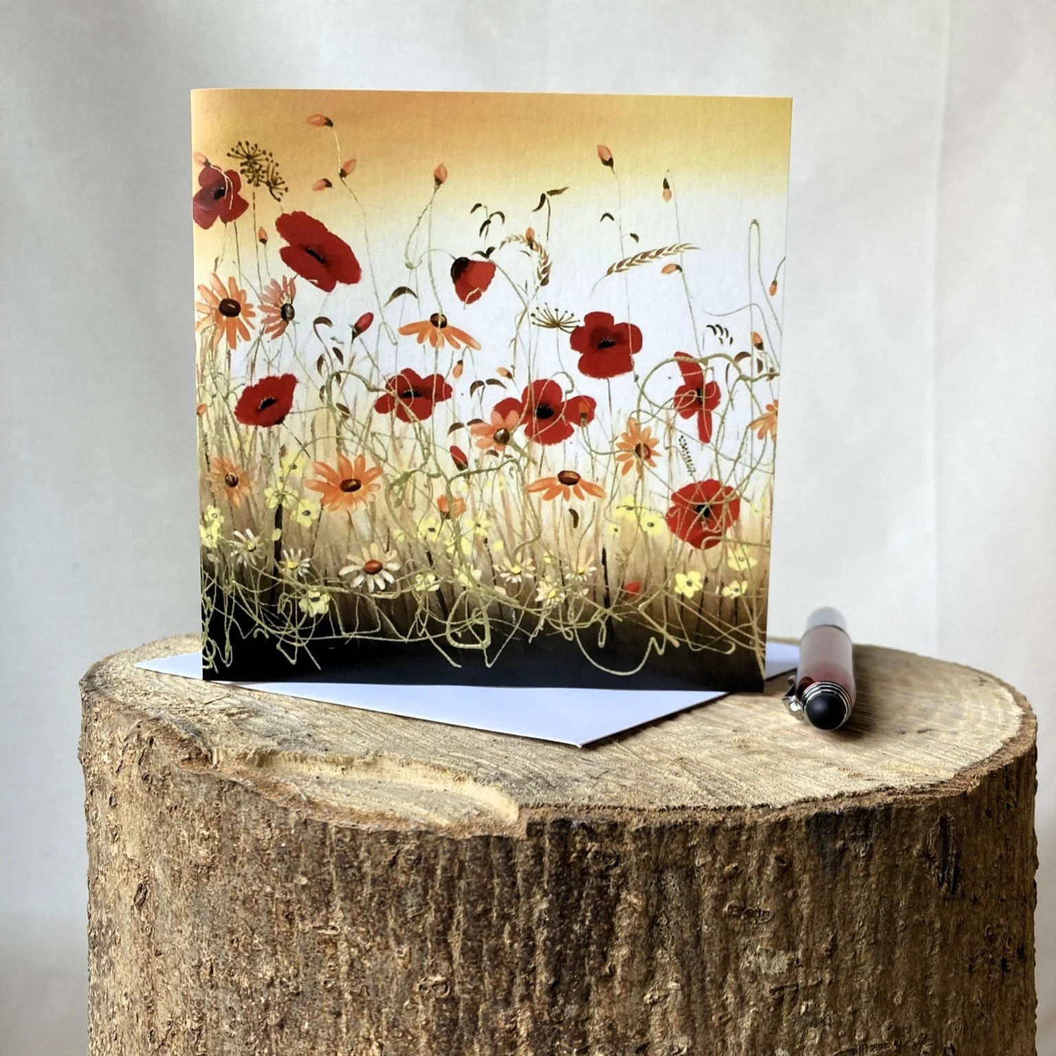 greetings card with floral meadow featuring red poppies.JPEG